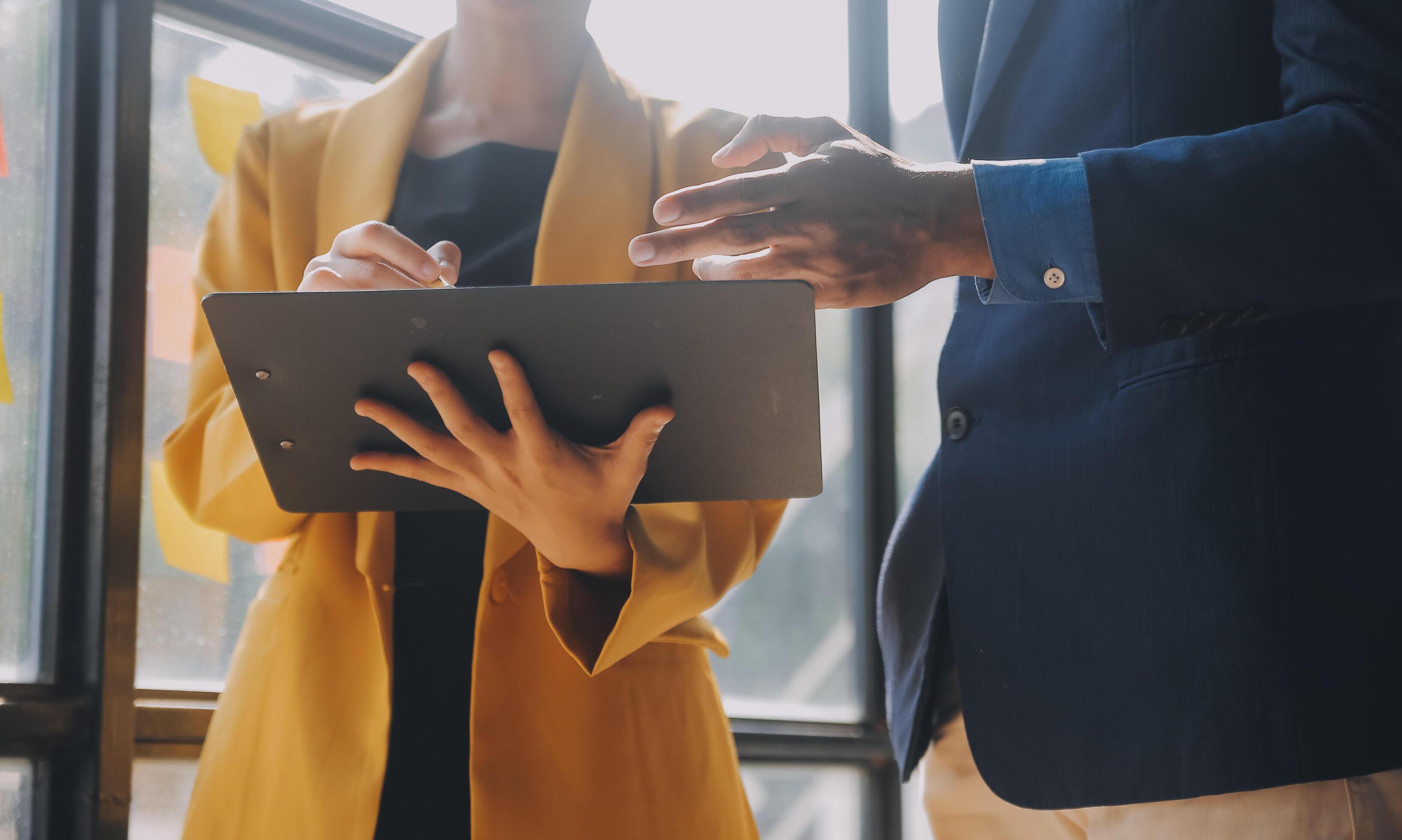 Close up of Business team analyzing income charts and graphs with modern laptop computer. Business analysis and strategy concept. Stock Free