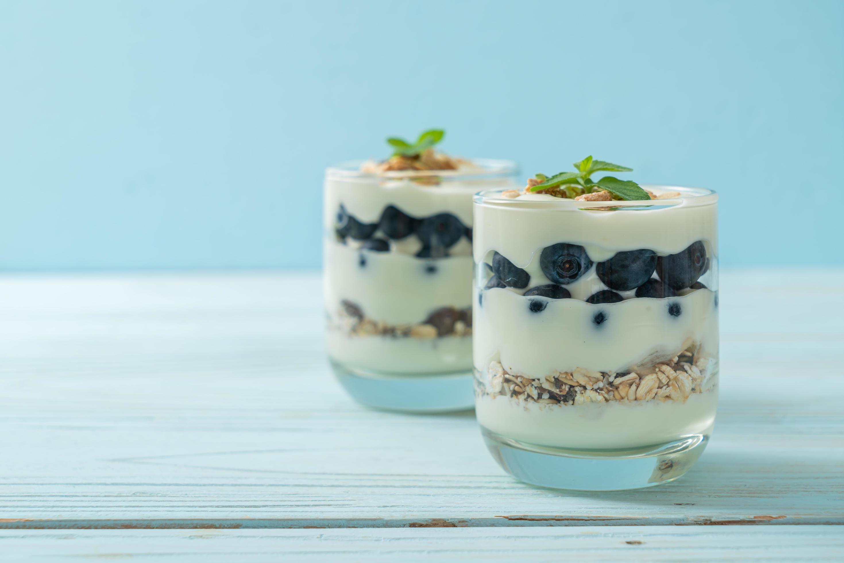 Fresh blueberries and yogurt with granola – Healthy food style Stock Free