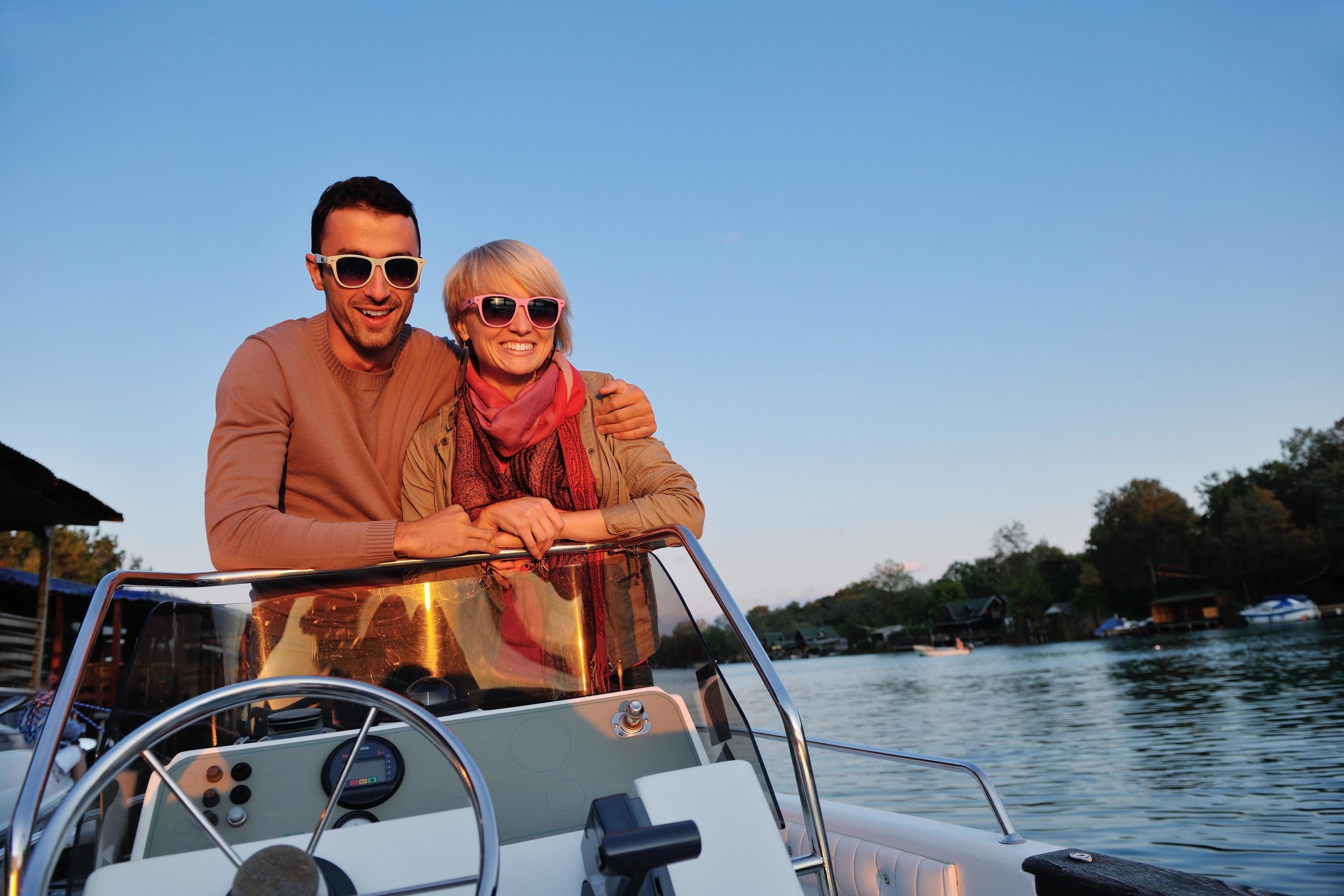 couple in love have romantic time on boat Stock Free