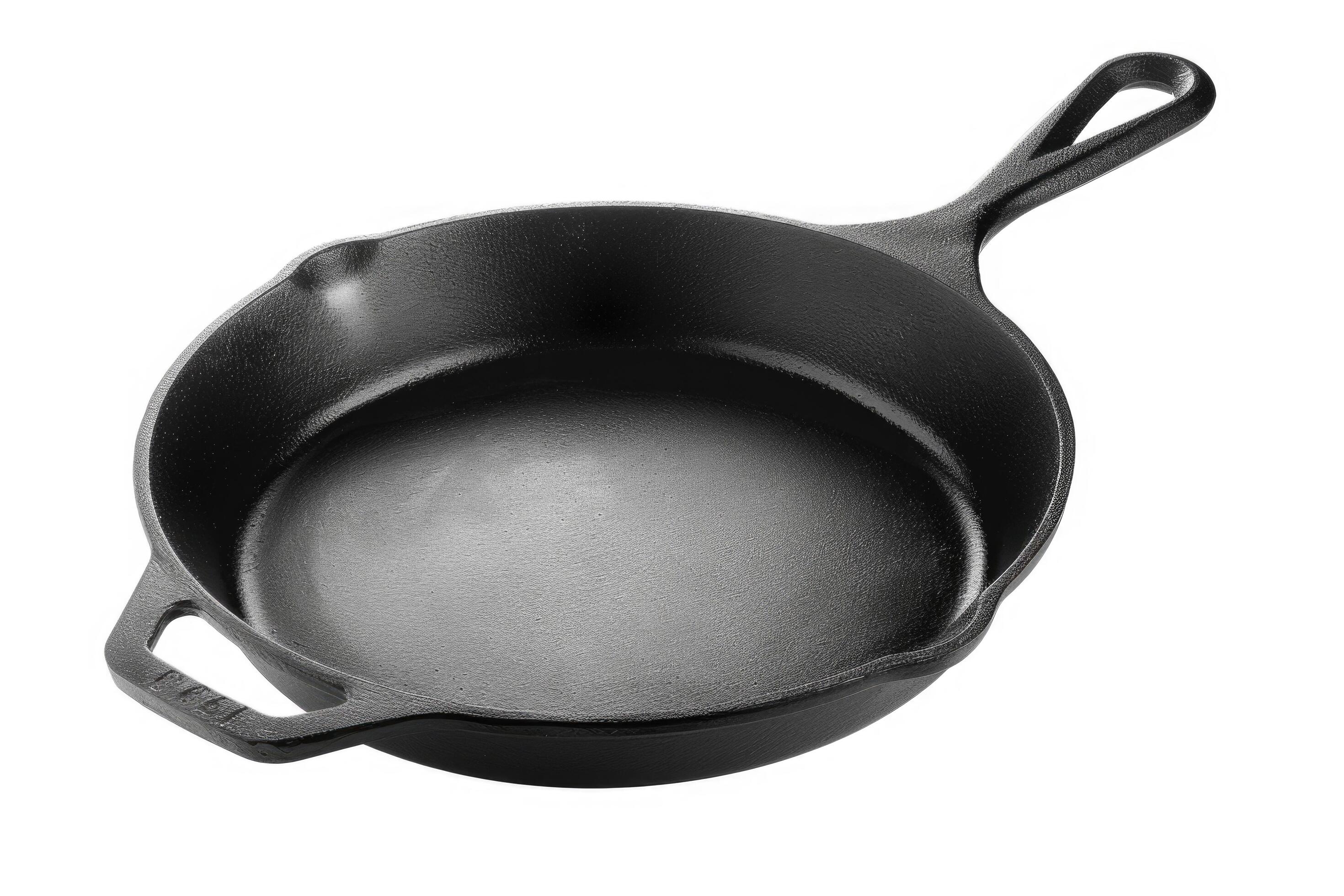 
									Black cast iron skillet on a white background. Stock Free