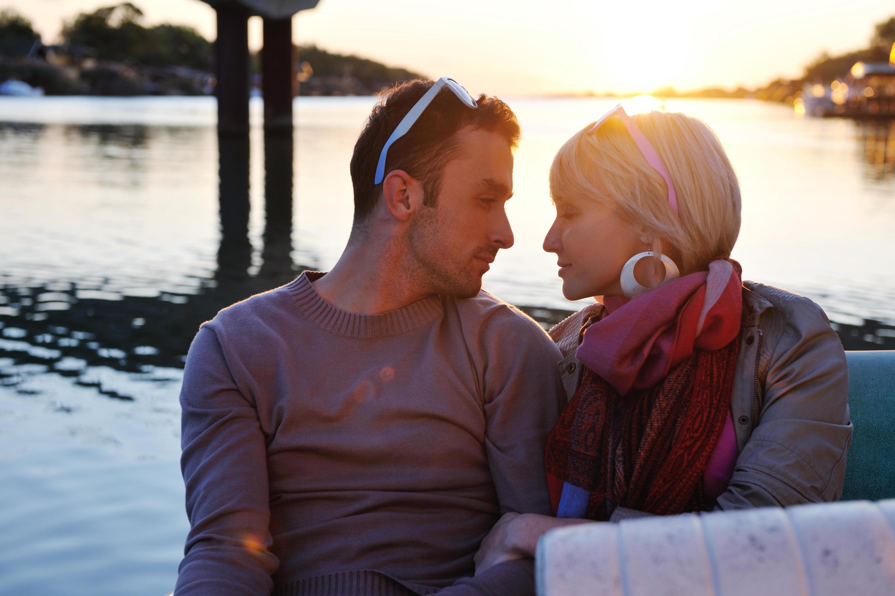 couple in love have romantic time on boat Stock Free