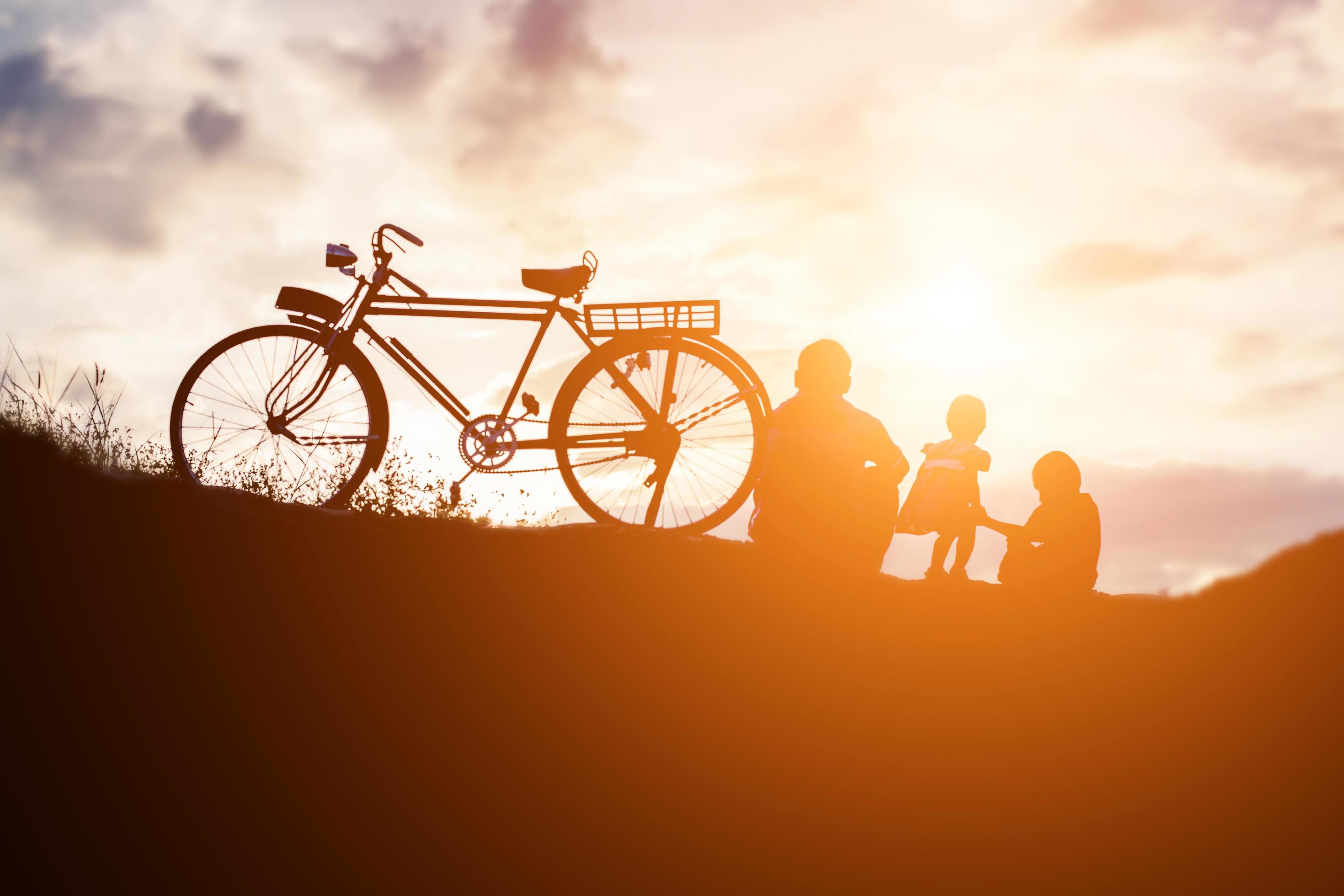 Biker family silhouette father and son Stock Free