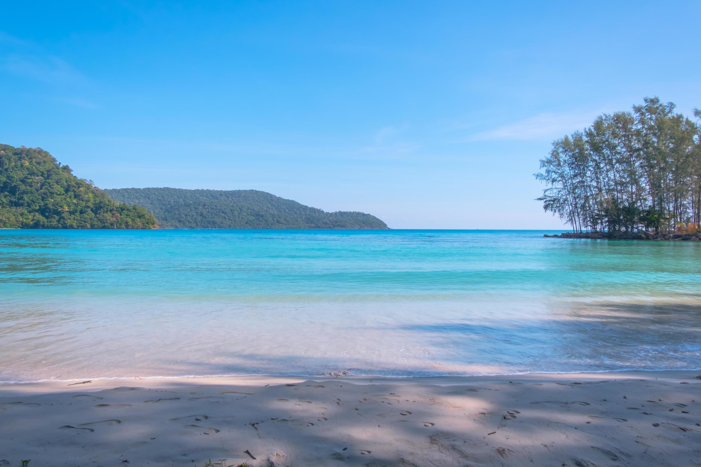 Beautiful sea on tropical beach as summer landscape with blue sky for travel in holiday relax time in summer Stock Free