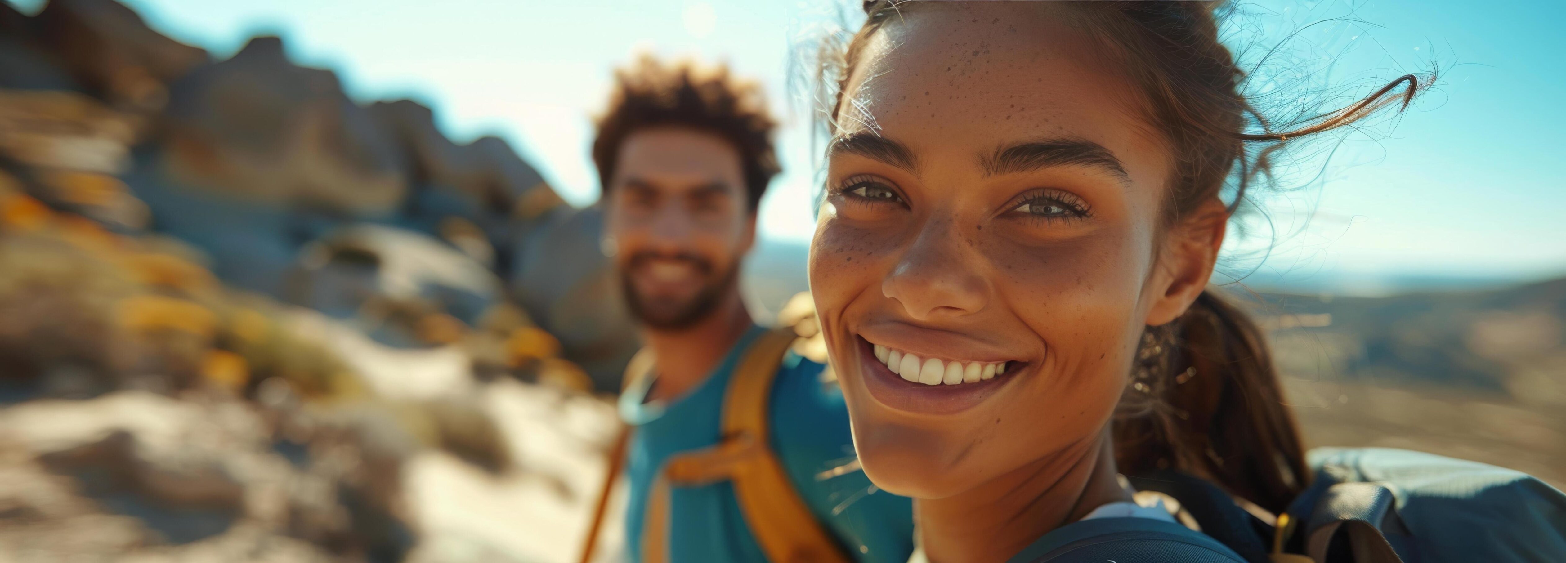 Smiling Woman Hiking With Backpack on Sunny Day Stock Free