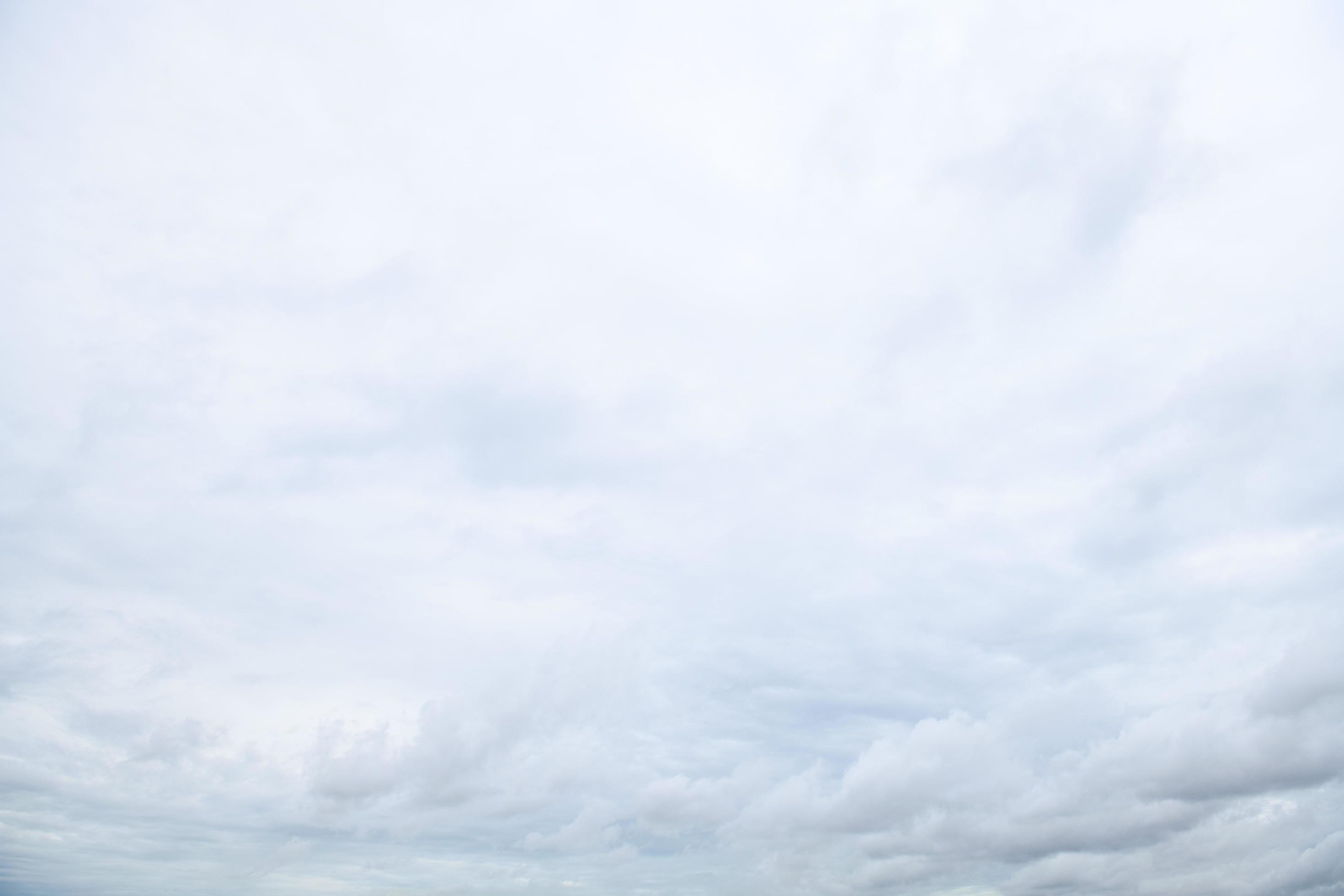 Beautiful white fluffy clouds in blue sky. Nature background from white cloud before raining Stock Free