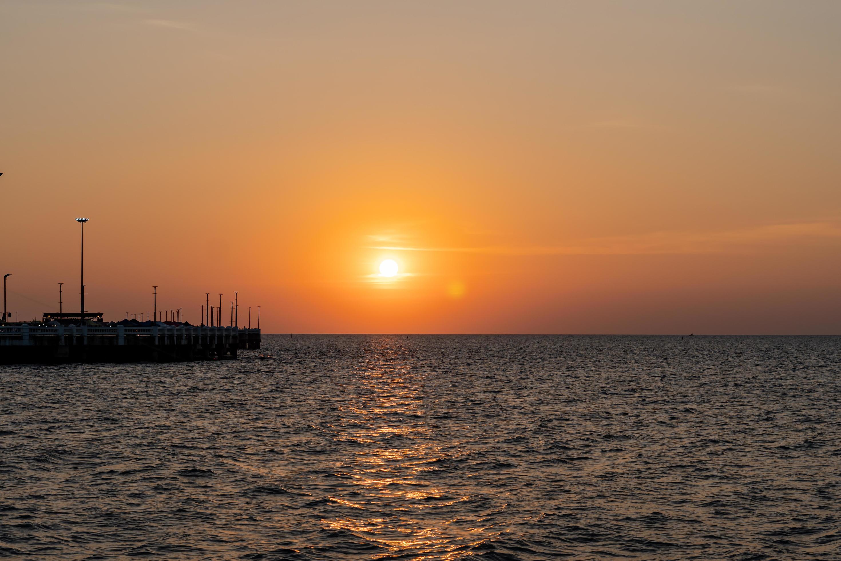 Silhouette of Sunset, The sea where the sun is golden yellow, Viewpoint of the sea Leamtan Bangsan Chonburi,Thailand Stock Free