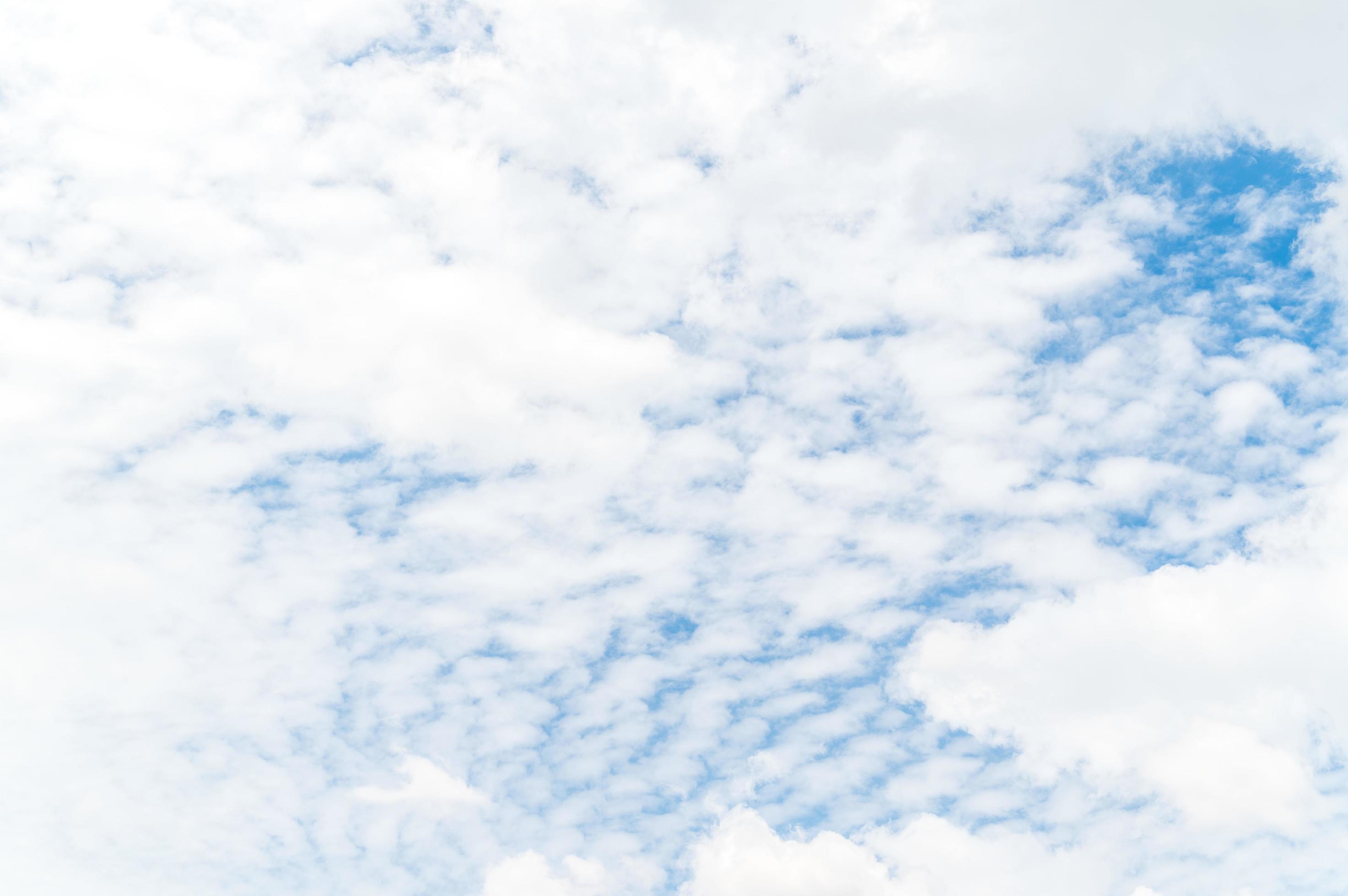 Beautiful white fluffy clouds in blue sky. Nature background from white clouds in sunny day Stock Free