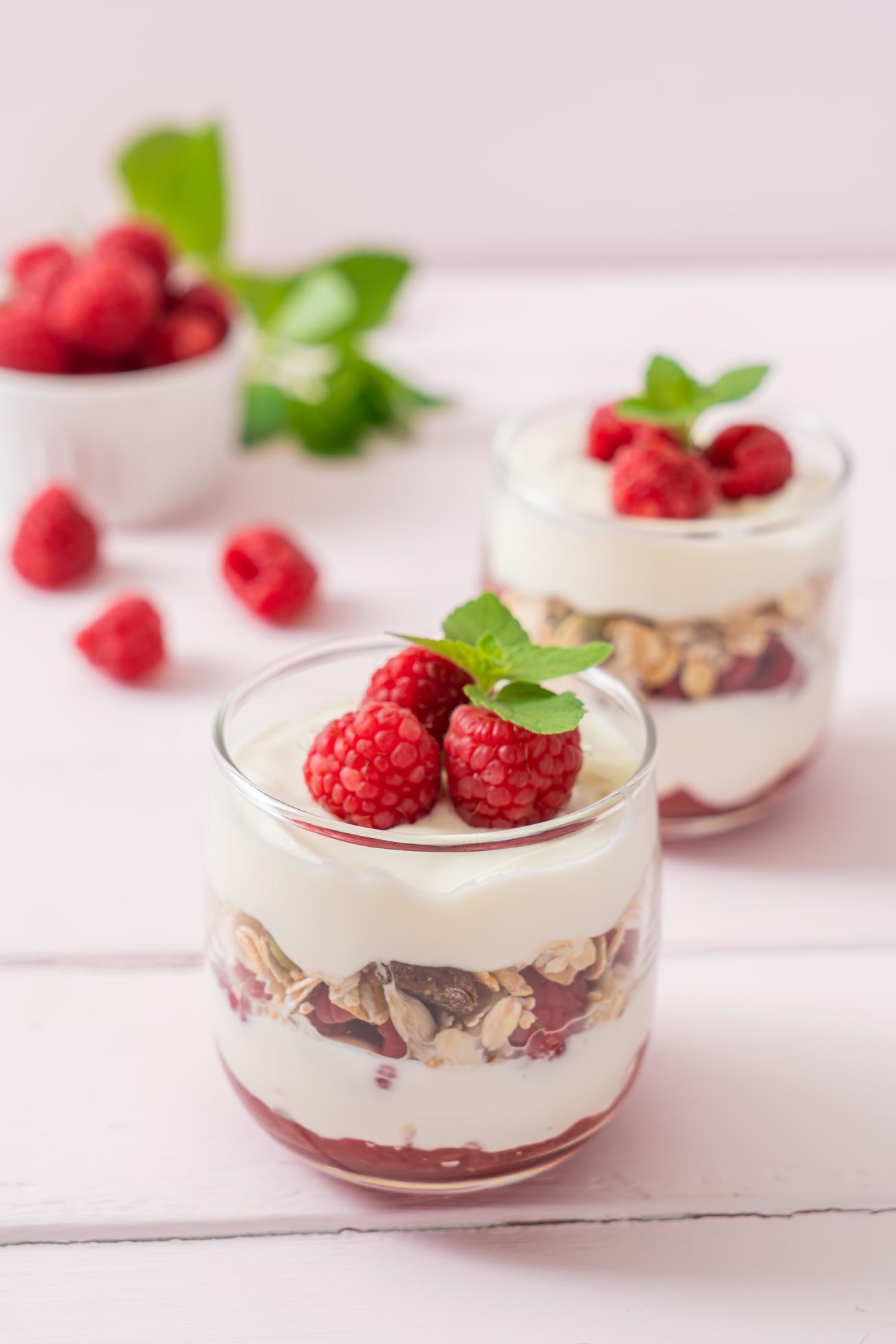 Fresh raspberry and yogurt with granola – Healthy food style Stock Free