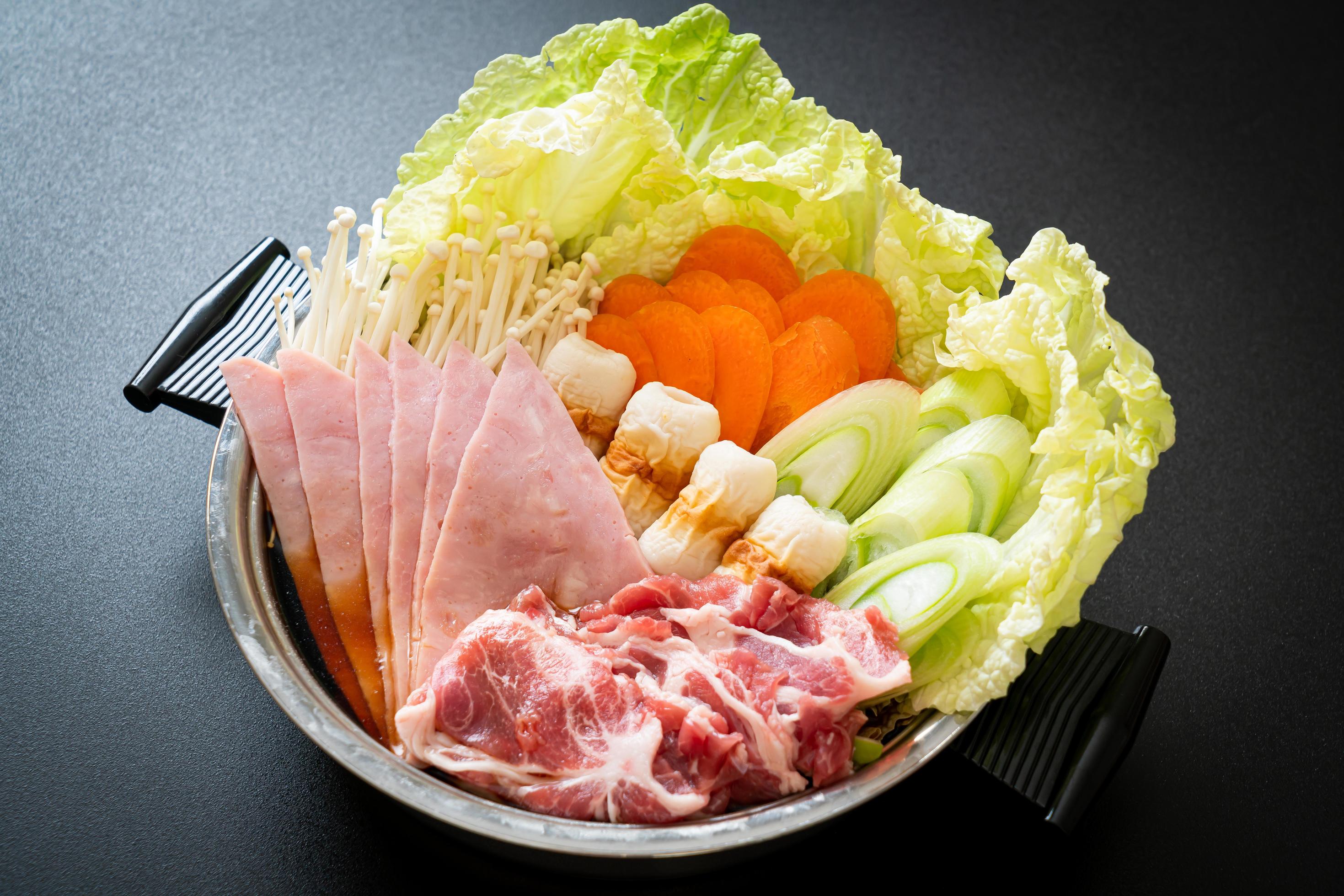 Sukiyaki or shabu hot pot black soup with meat raw and vegetable – Japanese food style Stock Free