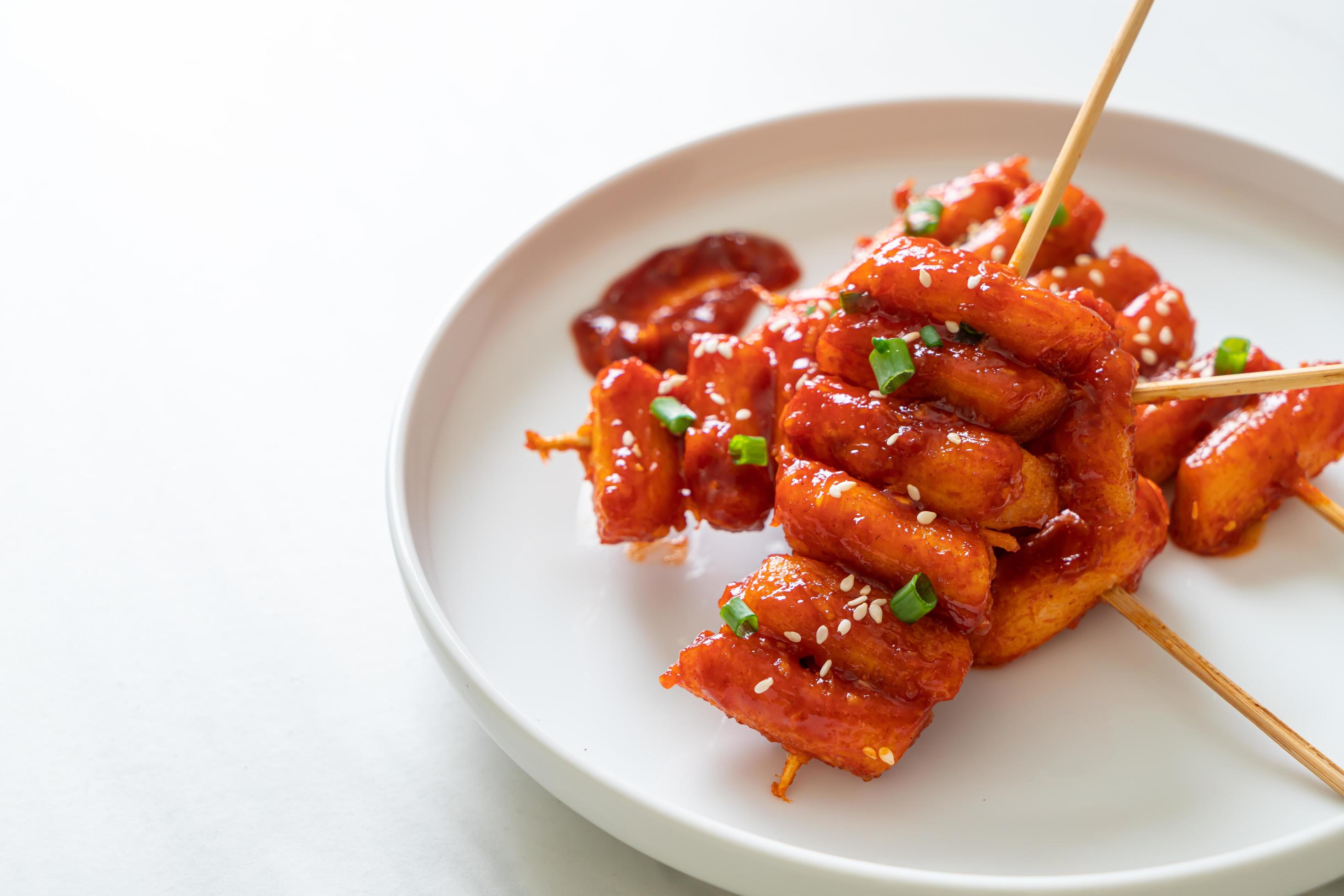 Deep-fried Korean rice cake, or Tteokbokki, with spicy sauce – Korean food style Stock Free