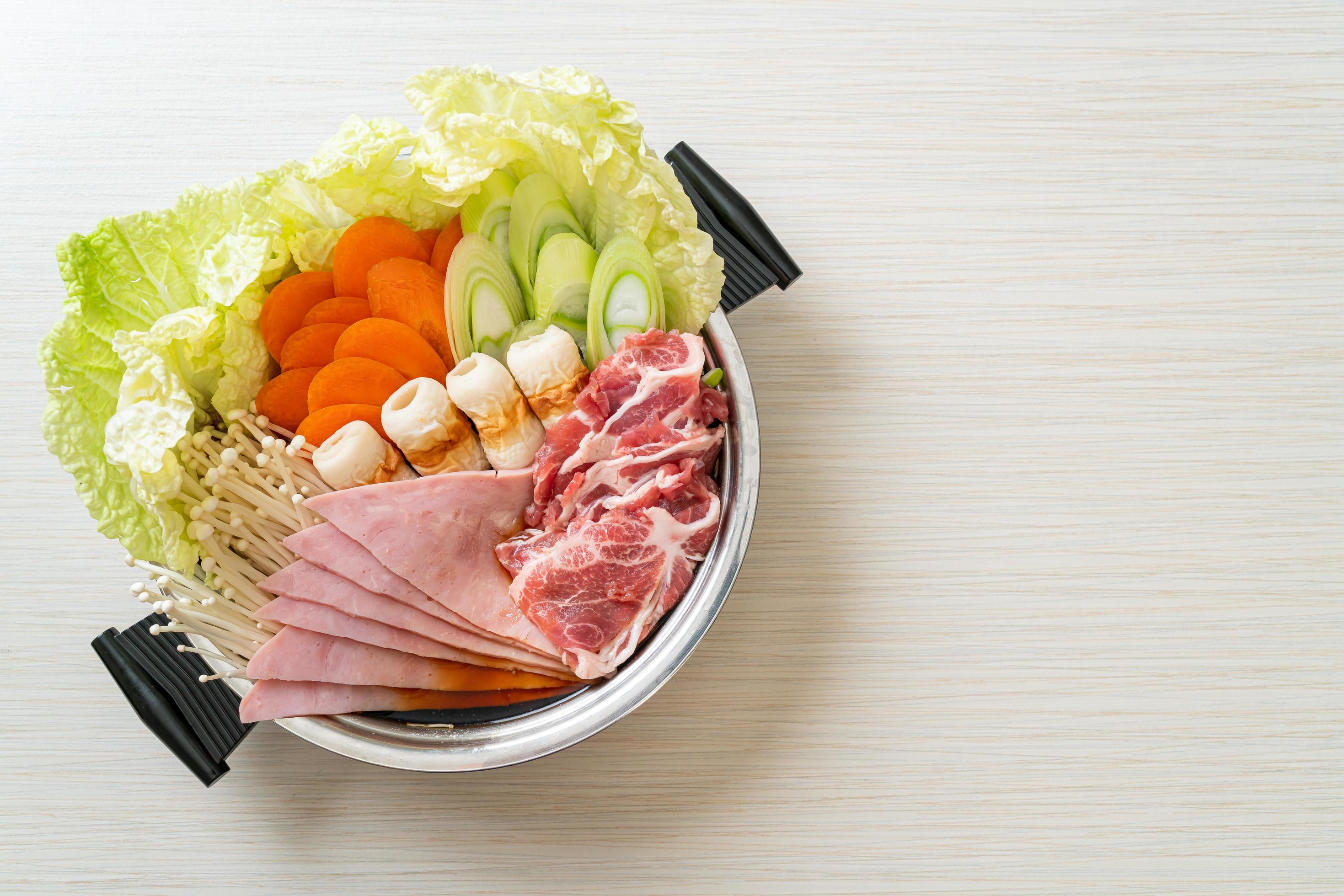 Sukiyaki or shabu hot pot black soup with meat raw and vegetable – Japanese food style Stock Free