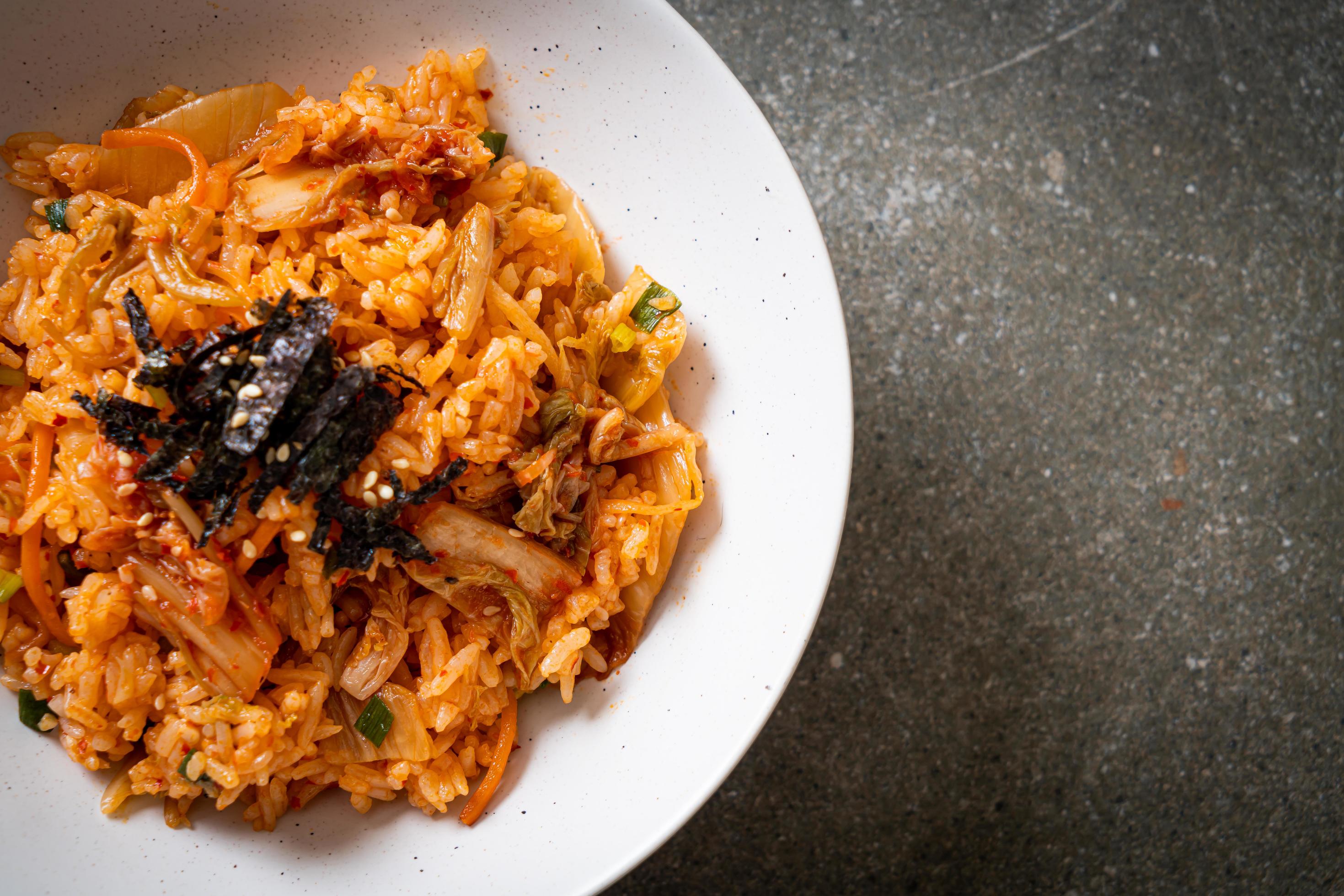 Kimchi fried rice with seaweed and white sesame – Korean food style Stock Free