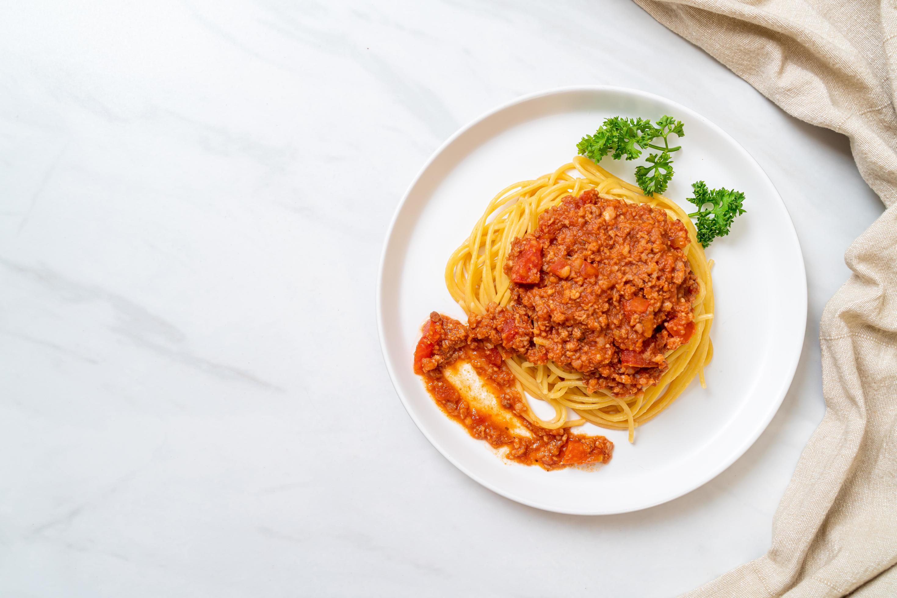 Spaghetti bolognese pork or spaghetti with minced pork tomato sauce – Italian food style Stock Free