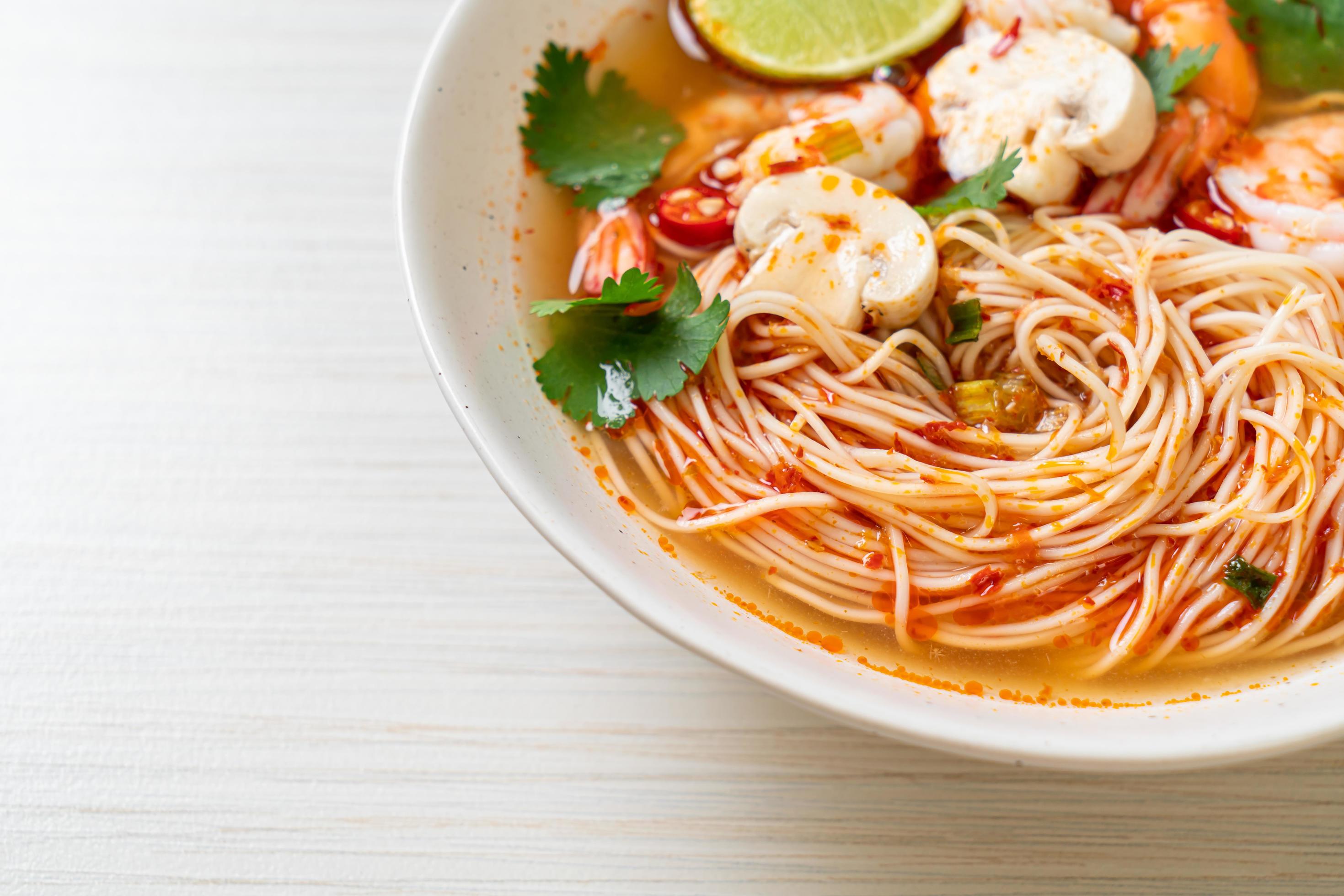 
									Noodles with spicy soup and shrimps or Tom Yum Kung – Asian food style Stock Free