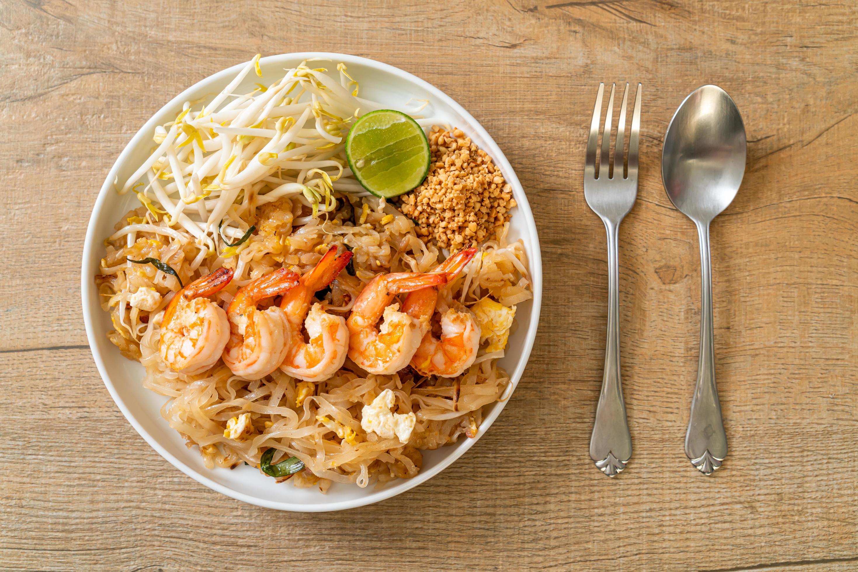 Stir-fried noodles with shrimp and sprouts or Pad Thai – Asian food style Stock Free