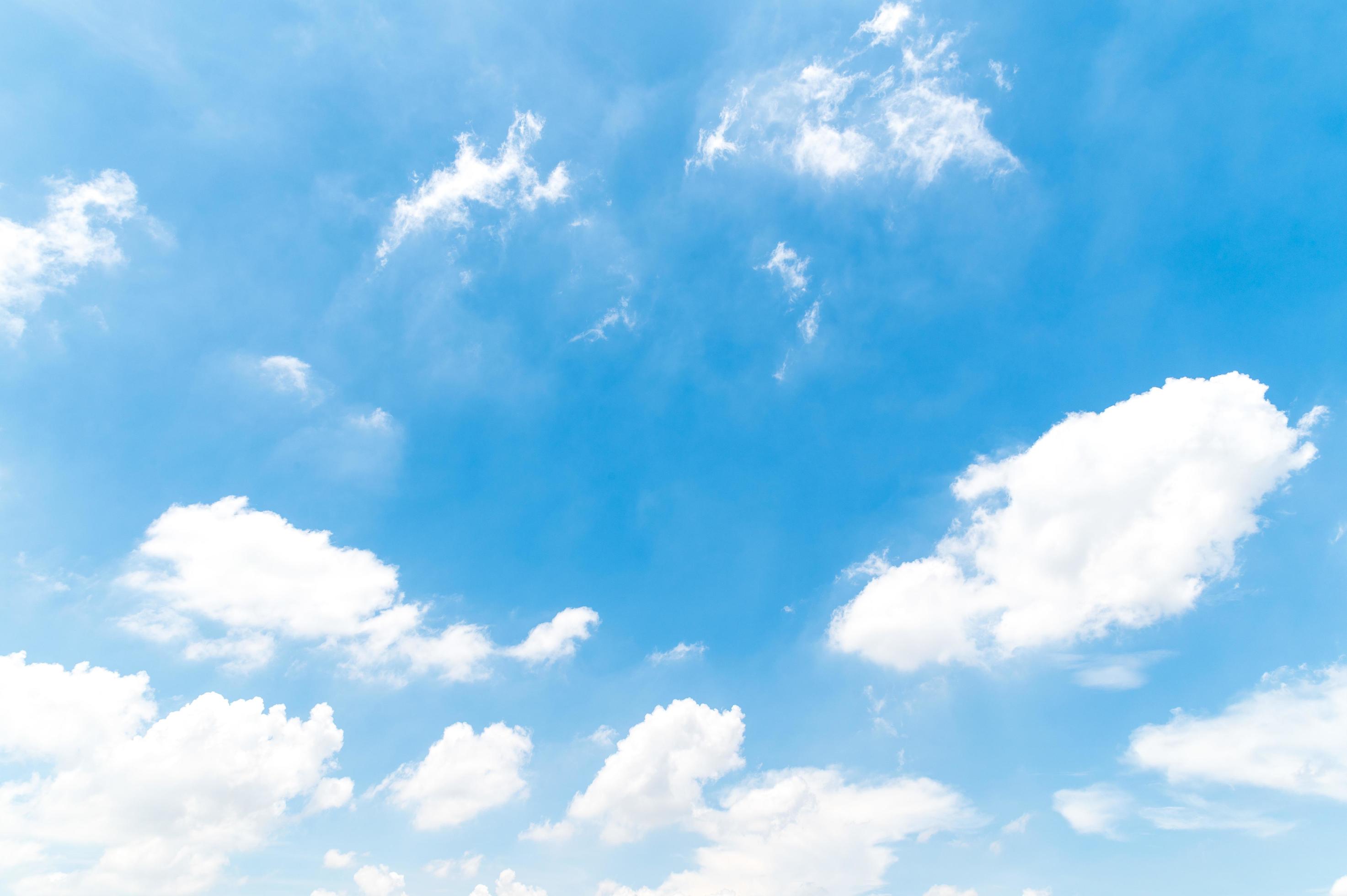 Beautiful white fluffy clouds in blue sky. Nature background from white cloud in sunny day Stock Free