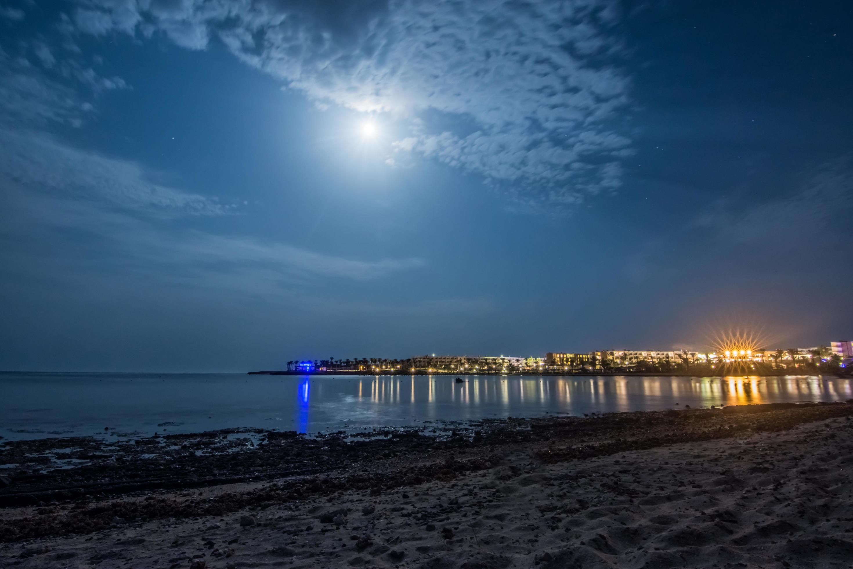 bright moon and colorful lights in the night on vacation in egypt Stock Free