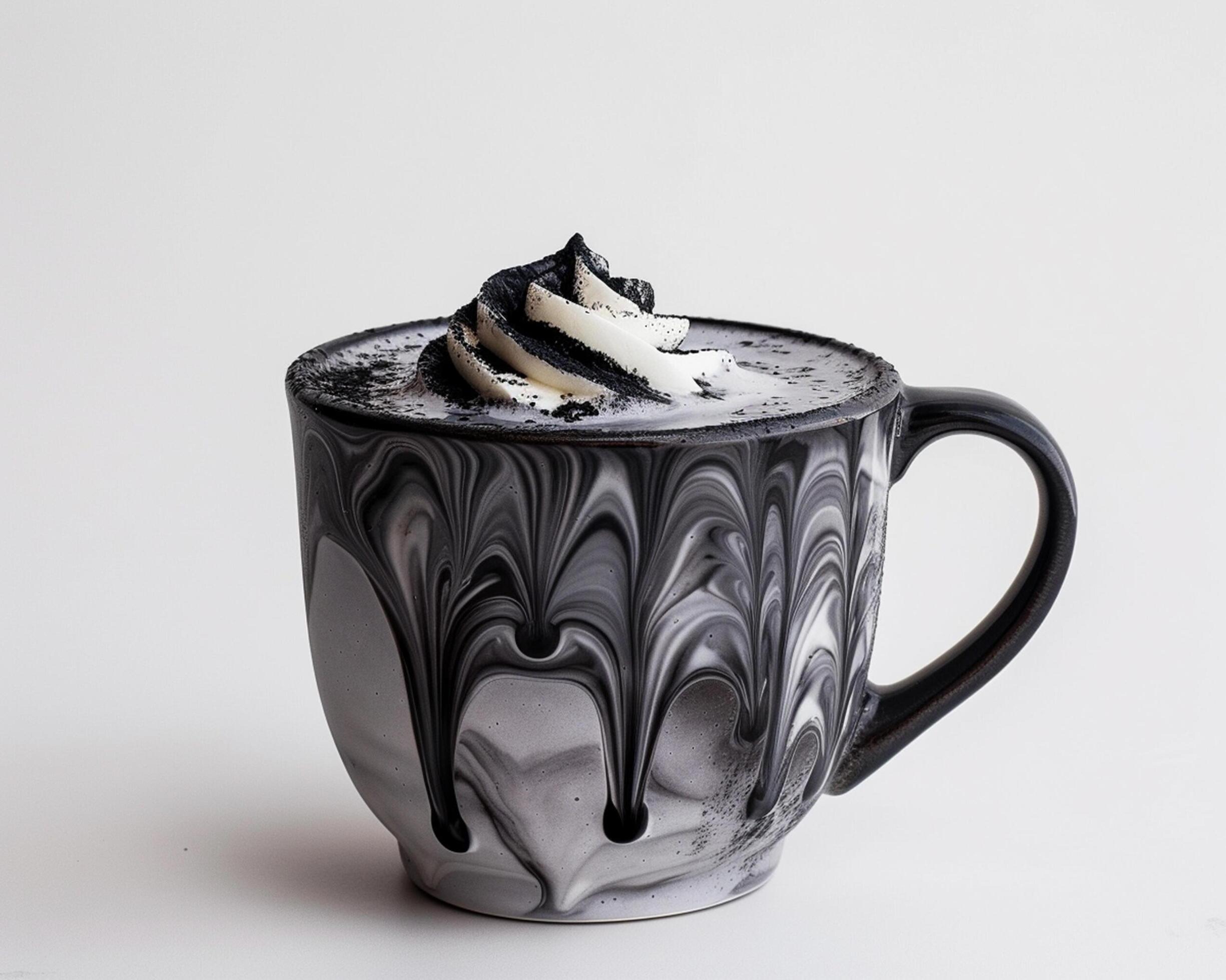 a black and white mug with whipped cream on top Stock Free