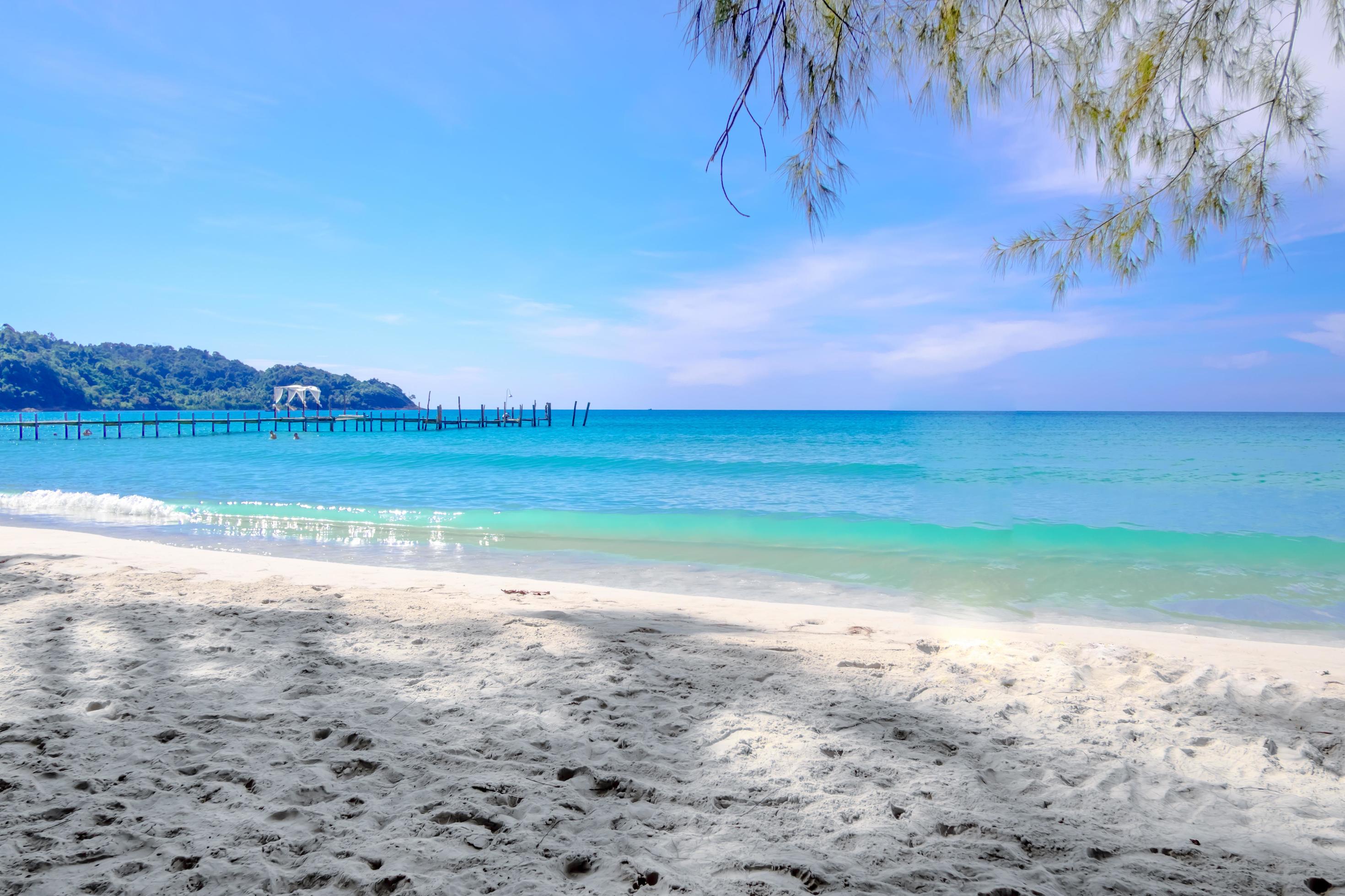 Beautiful sea on tropical beach as summer landscape with blue sky for travel in holiday relax time in summer Stock Free