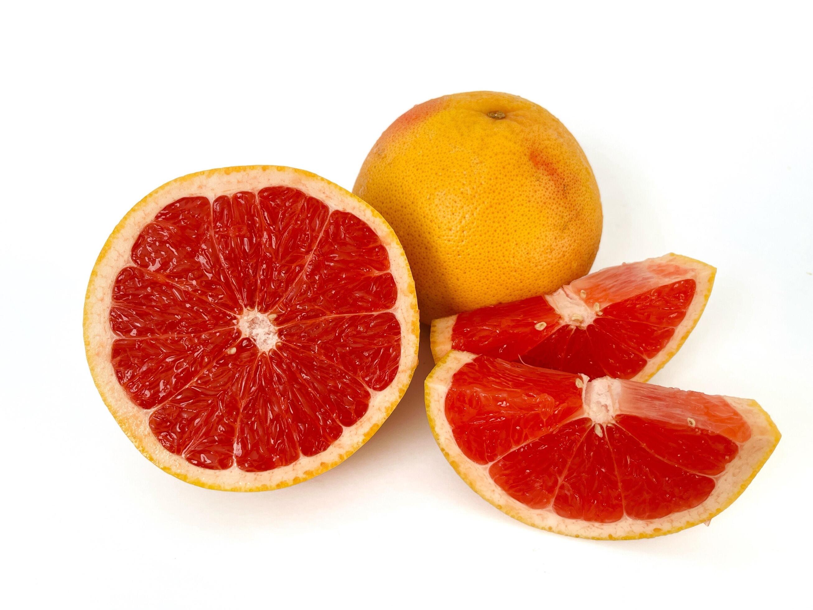 Fresh grapefruit fruit. Grapefruit isolated on white background. Grapefruit with clipping path. Stock Free