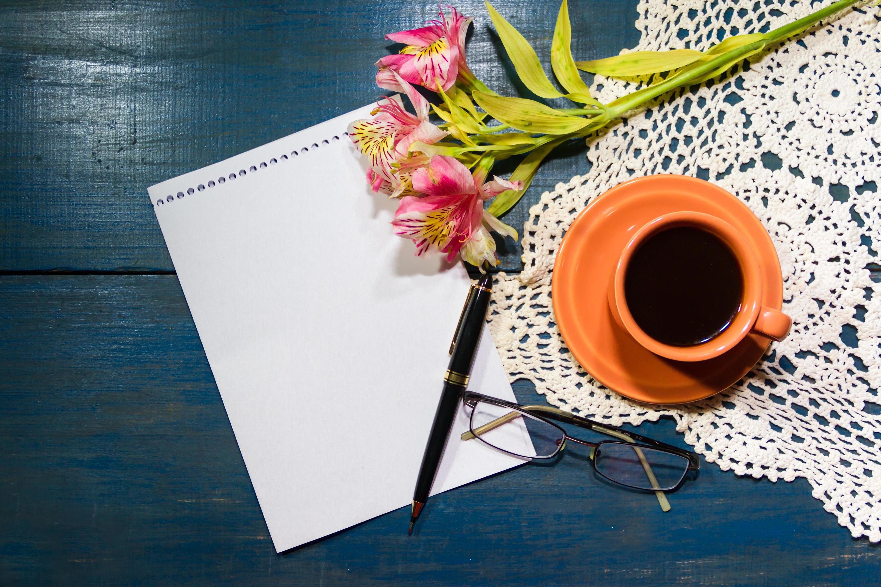 cup of coffee with flowers and note with place for text Stock Free