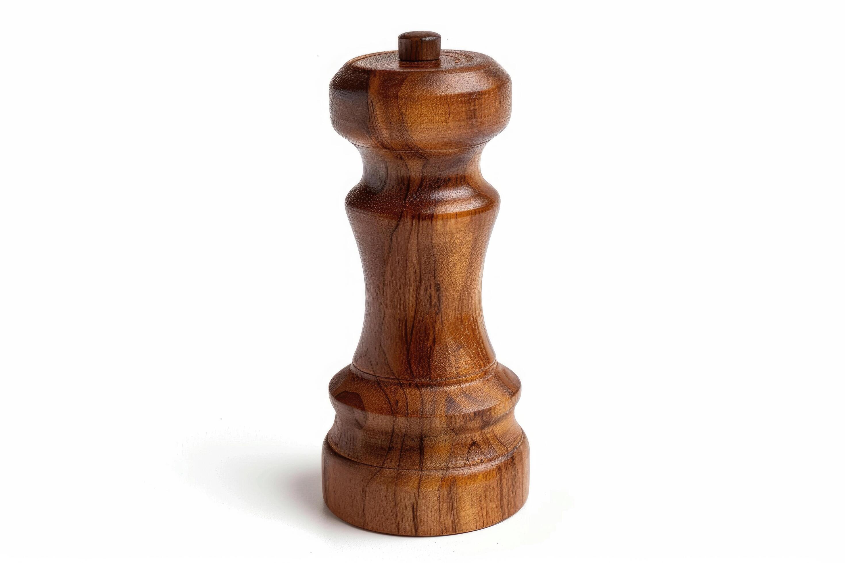 Wooden pepper mill on a white background. Stock Free