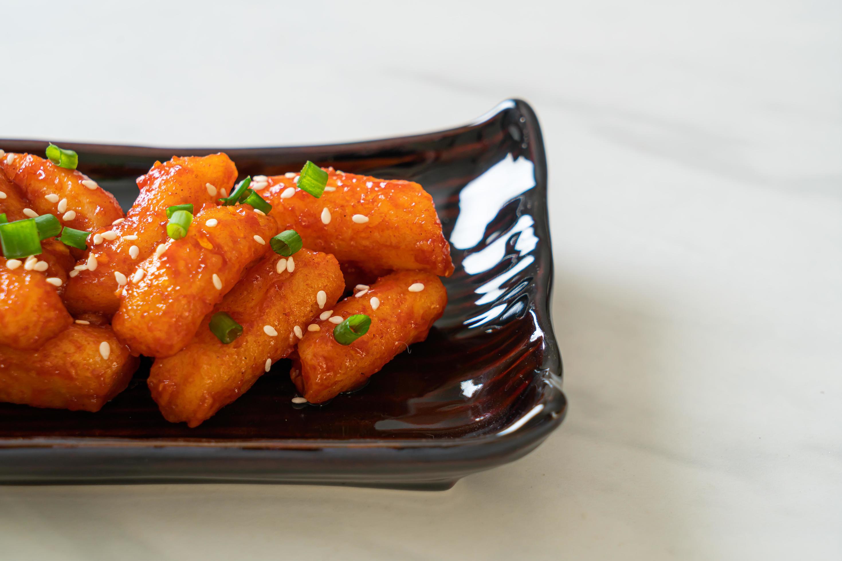 Deep-fried Korean rice cake, or Tteokbokki, with spicy sauce – Korean food style Stock Free