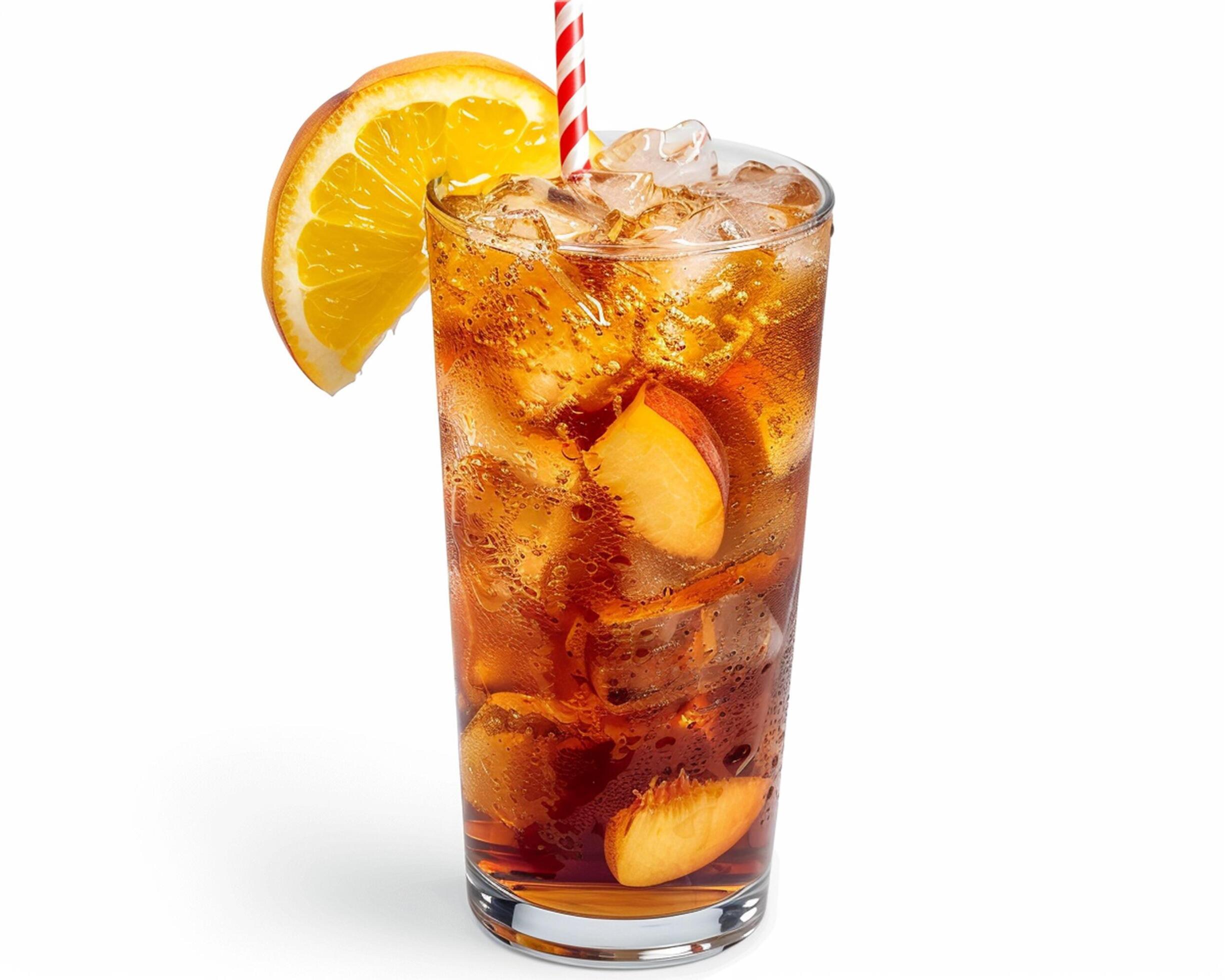 a glass of iced tea with orange slices and a straw Stock Free