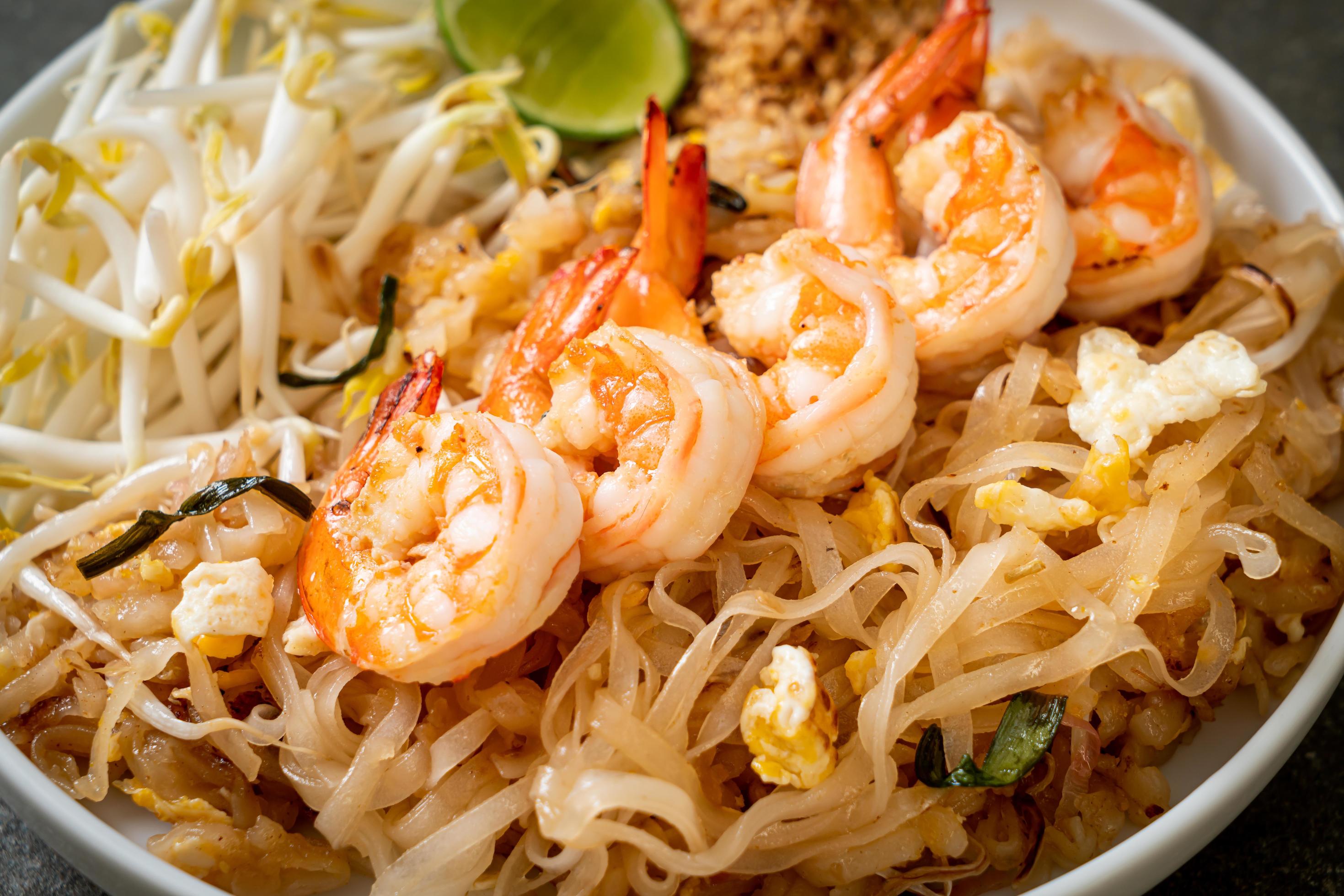 Stir-fried noodles with shrimp and sprouts or Pad Thai – Asian food style Stock Free