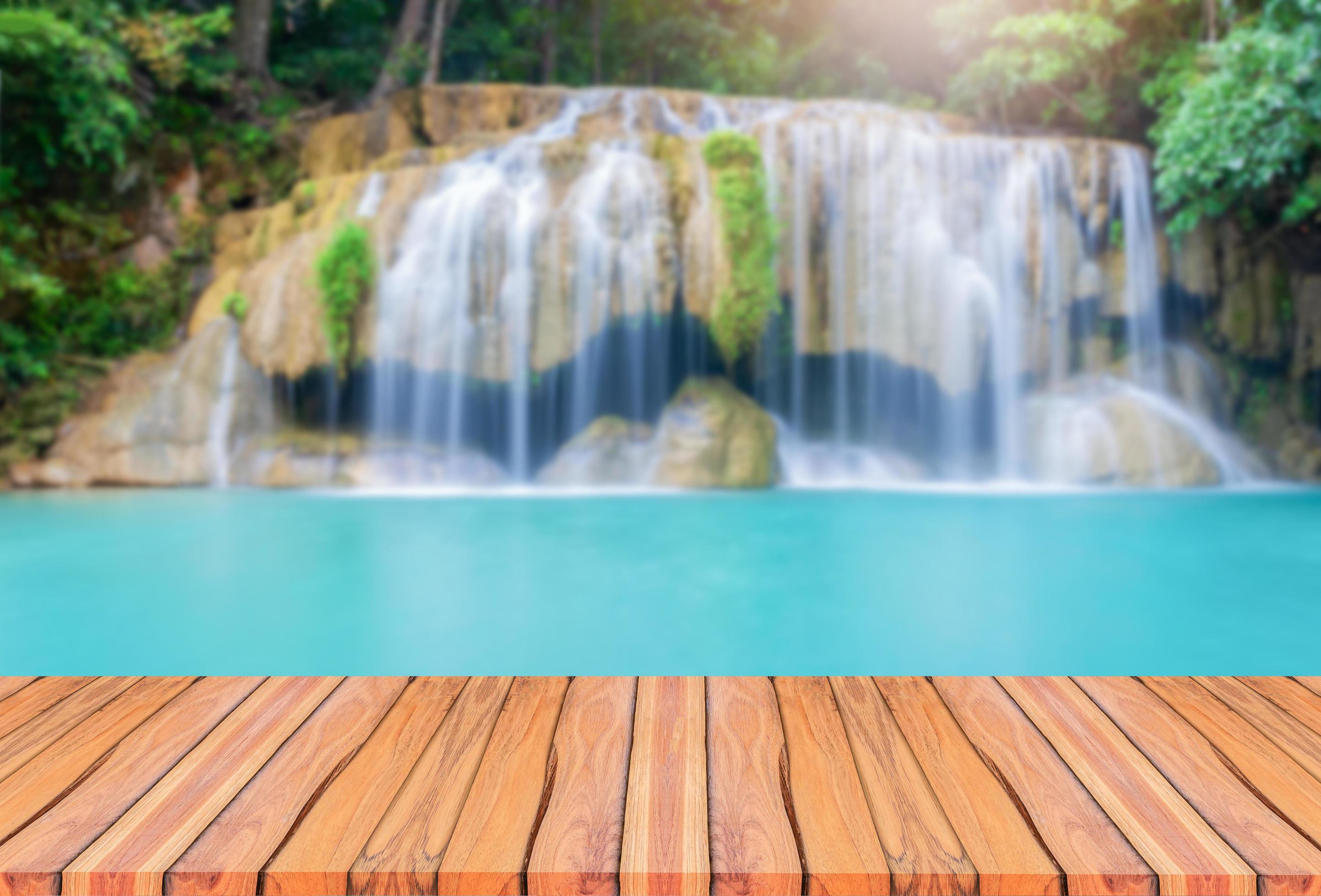 Natural wooden floors and a beautiful Erawan waterfall. Stock Free