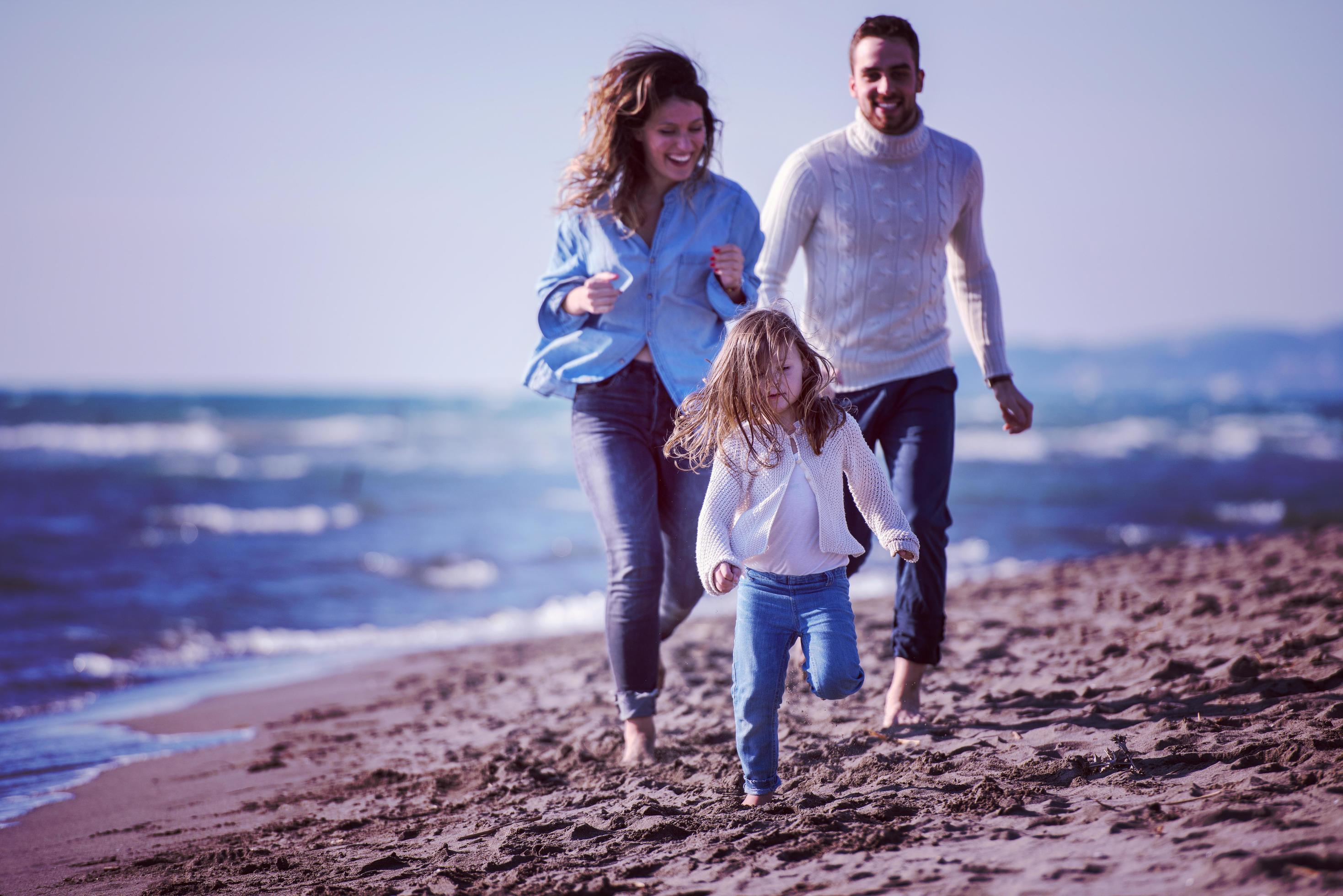 Young family enjoying vecation during autumn Stock Free