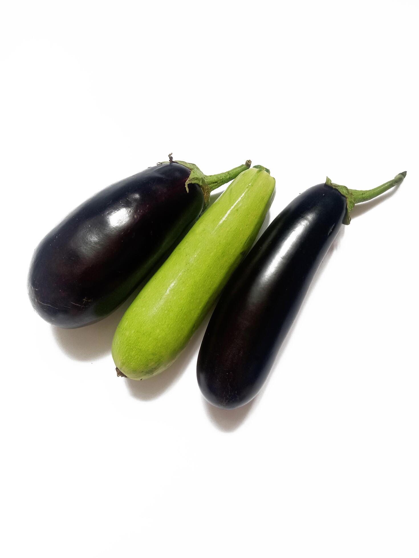 zucchini and eggplant on white background Stock Free