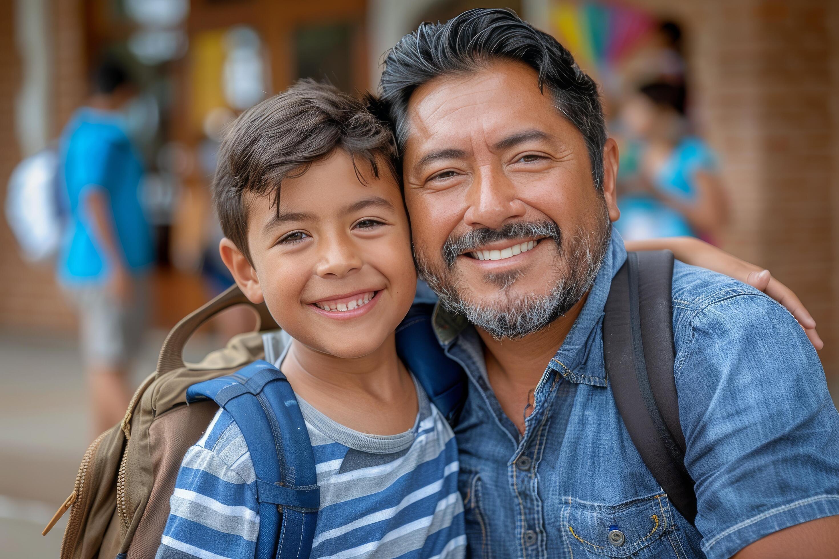 Happy Father and Son Smiling Together Outside on a Cloudy Day Stock Free