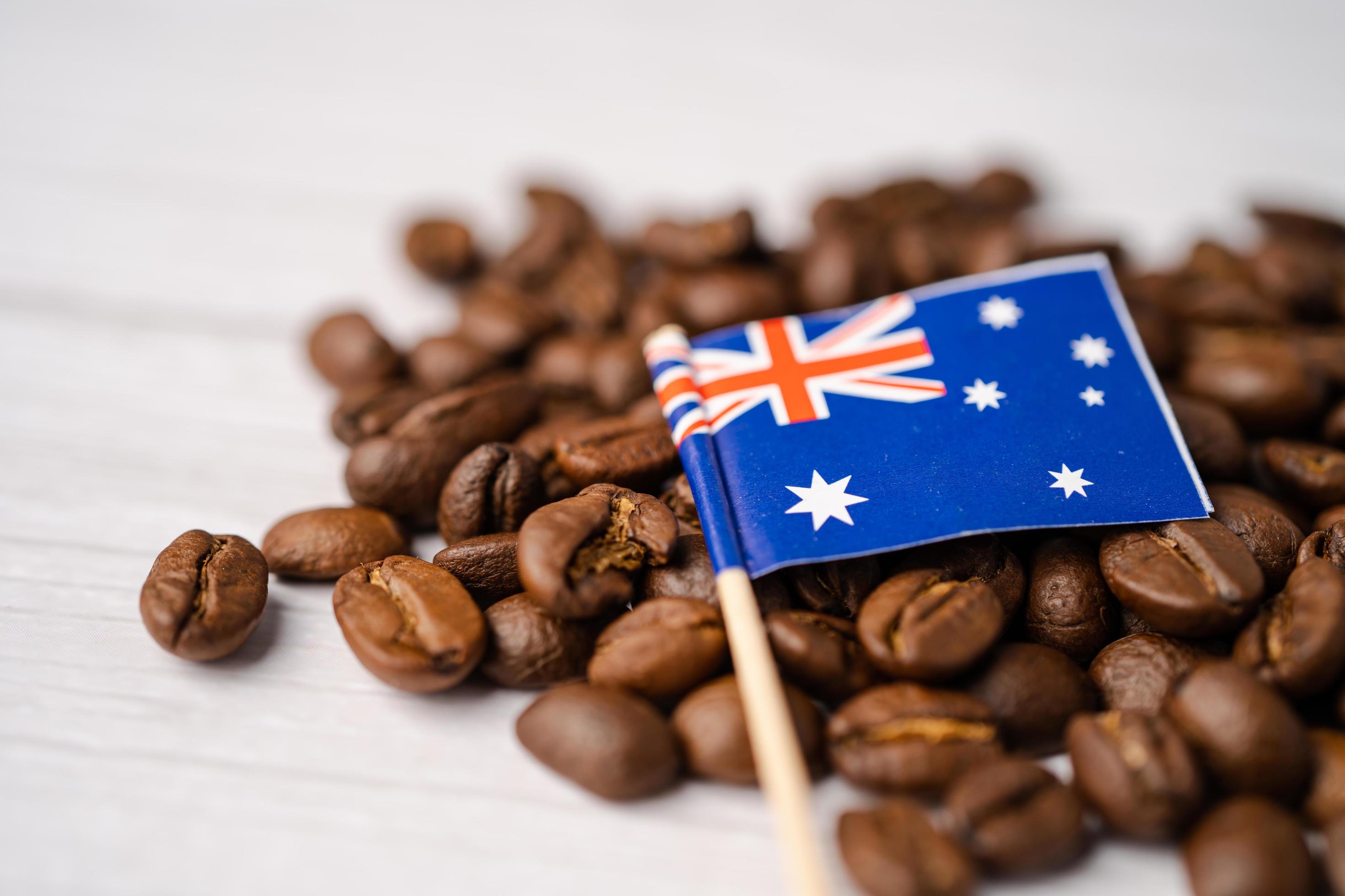 Australia flag on coffee beans, import export drink food concept. Stock Free