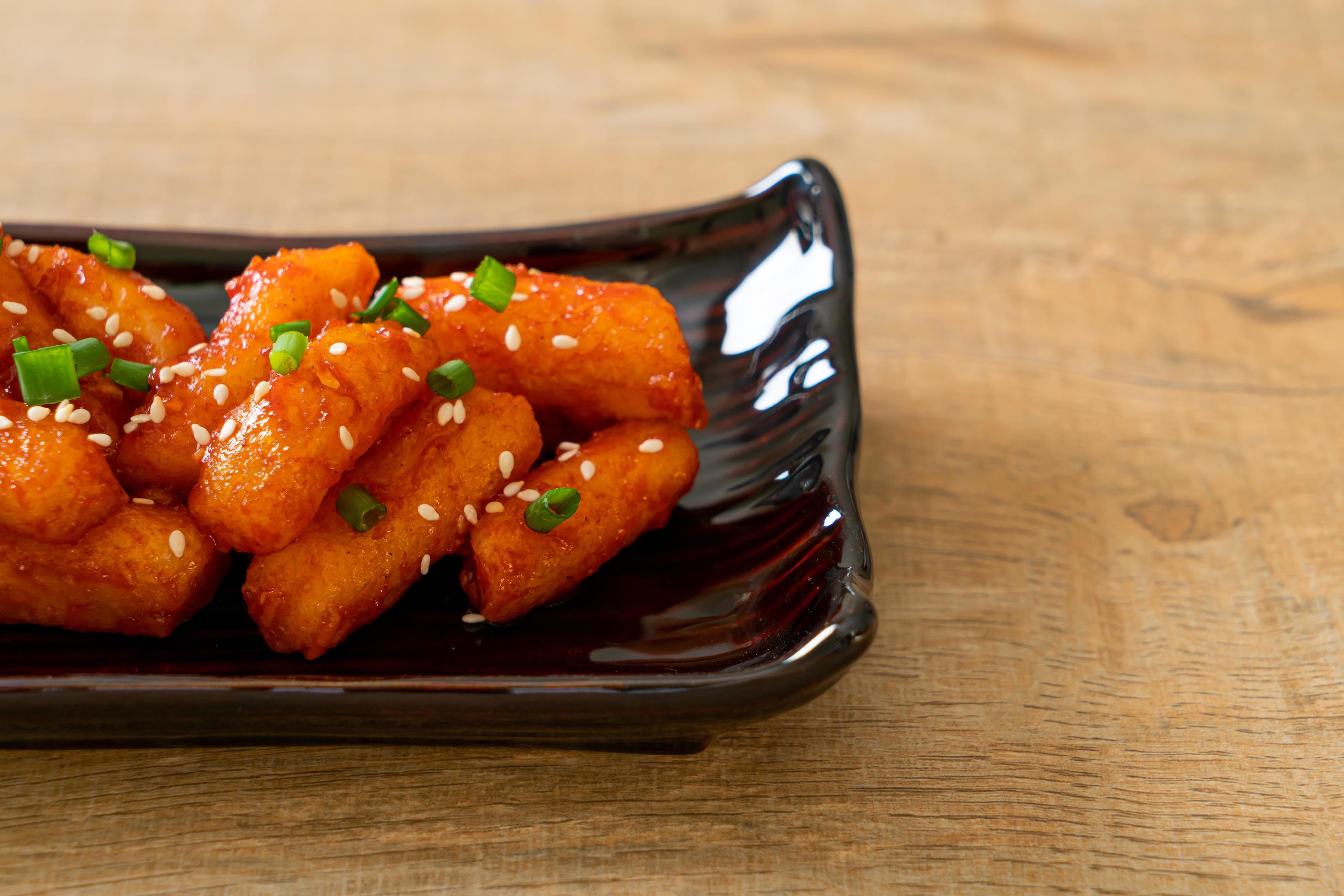 Deep-fried Korean rice cake, or Tteokbokki, with spicy sauce – Korean food style Stock Free