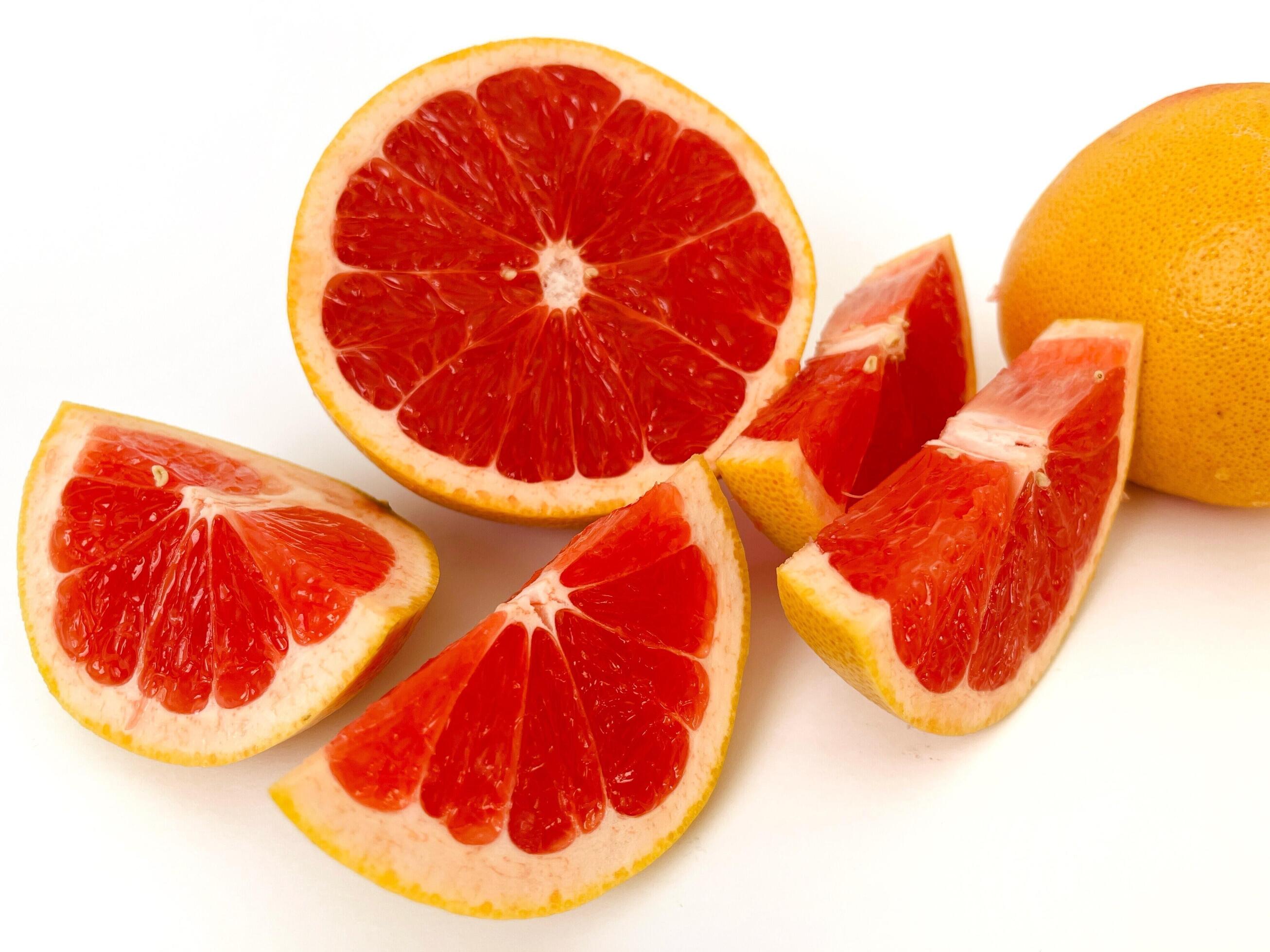 Fresh grapefruit fruit. Grapefruit isolated on white background. Grapefruit with clipping path. Stock Free