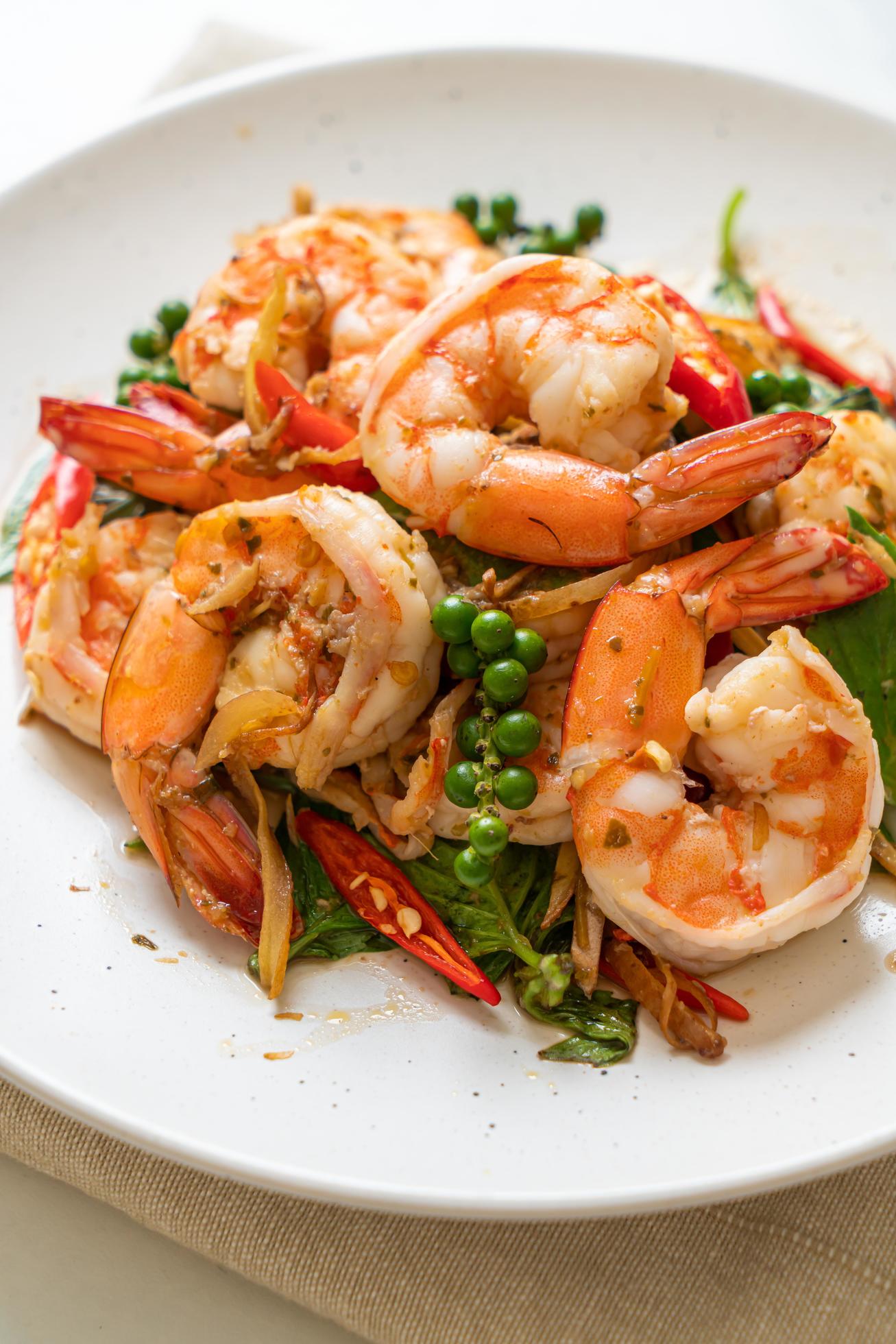 Stir-fried holy basil with shrimps and herb – Asian food style Stock Free