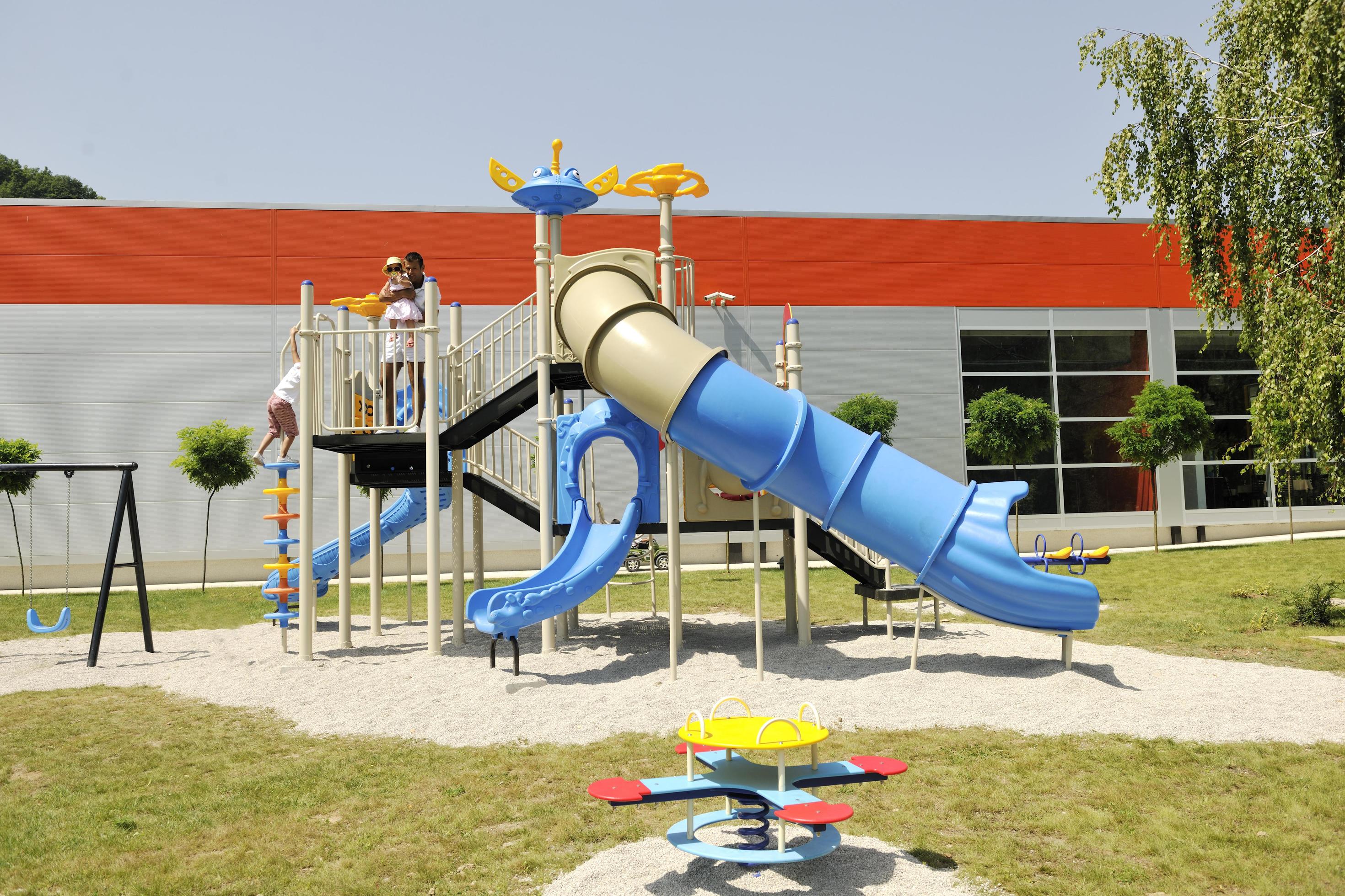 family portrait at park playground Stock Free