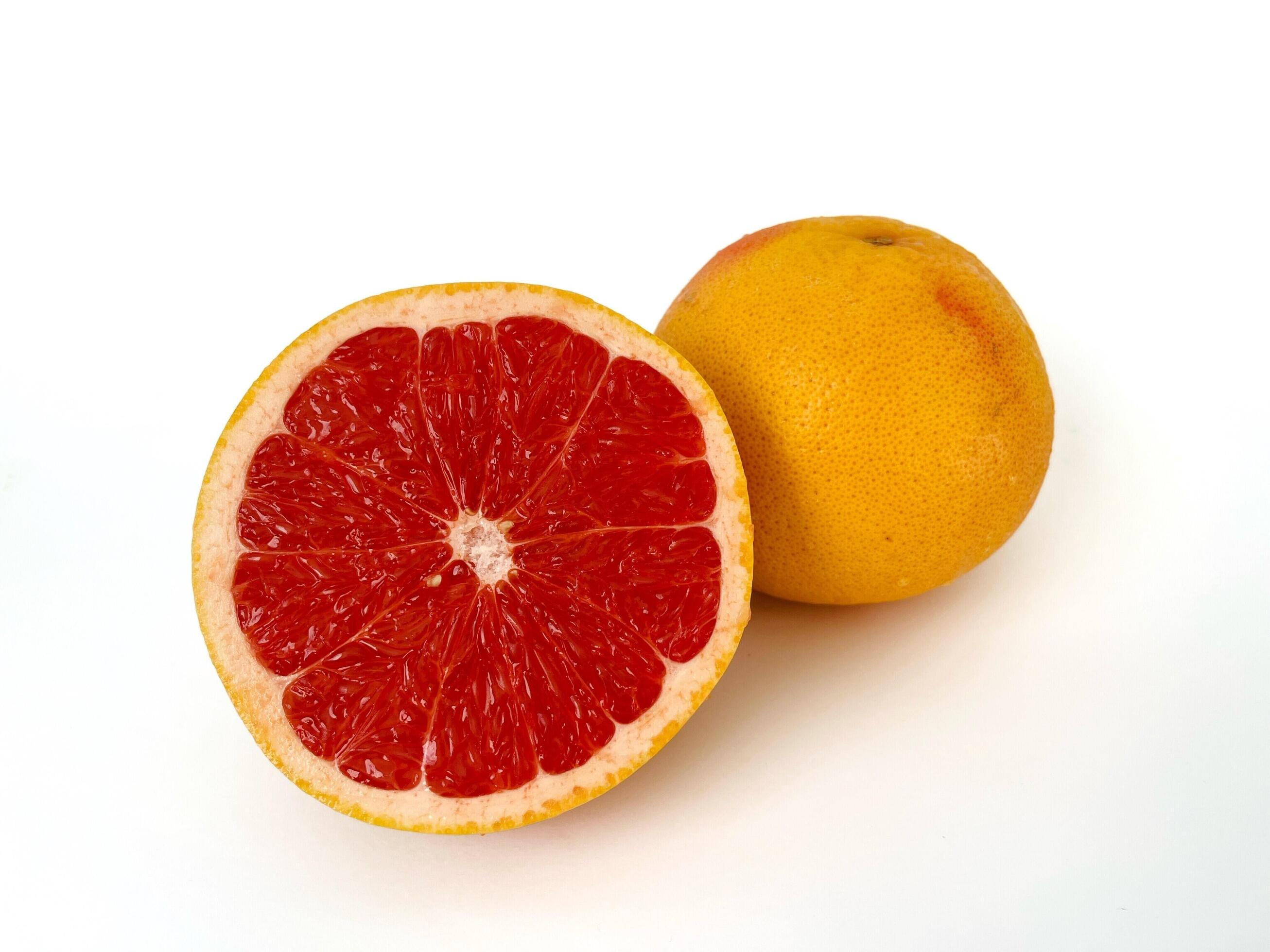 Fresh grapefruit fruit. Grapefruit isolated on white background. Grapefruit with clipping path. Stock Free