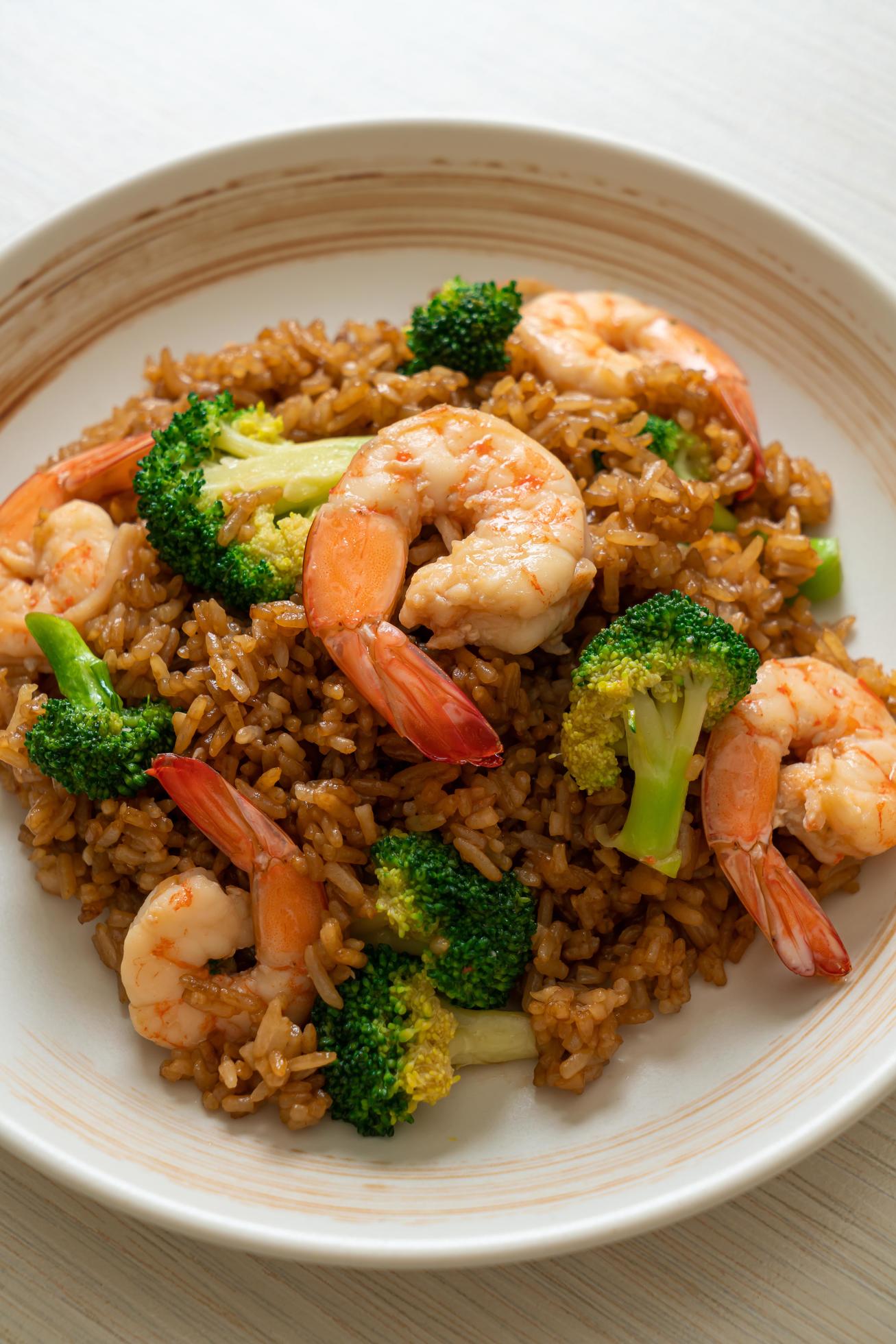 Fried rice with broccoli and shrimp – Homemade food style Stock Free