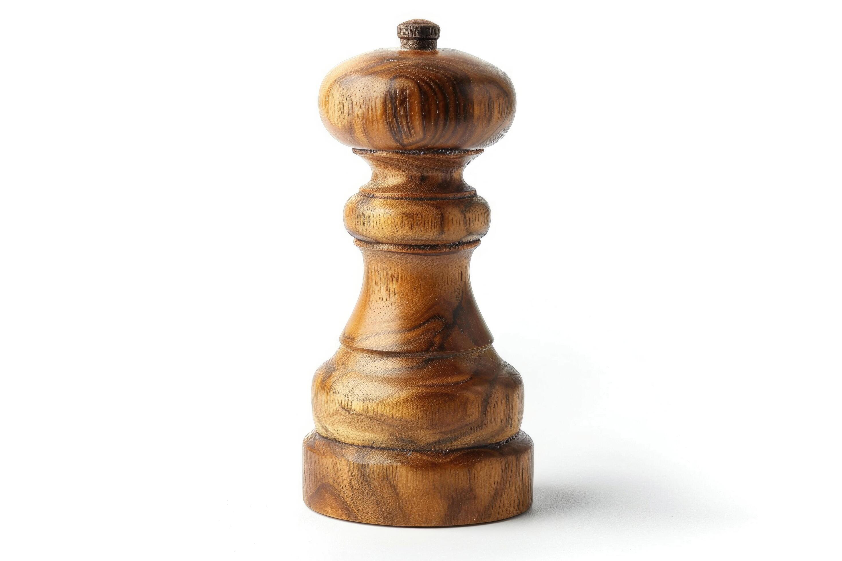 Wooden pepper mill on a white background. Stock Free