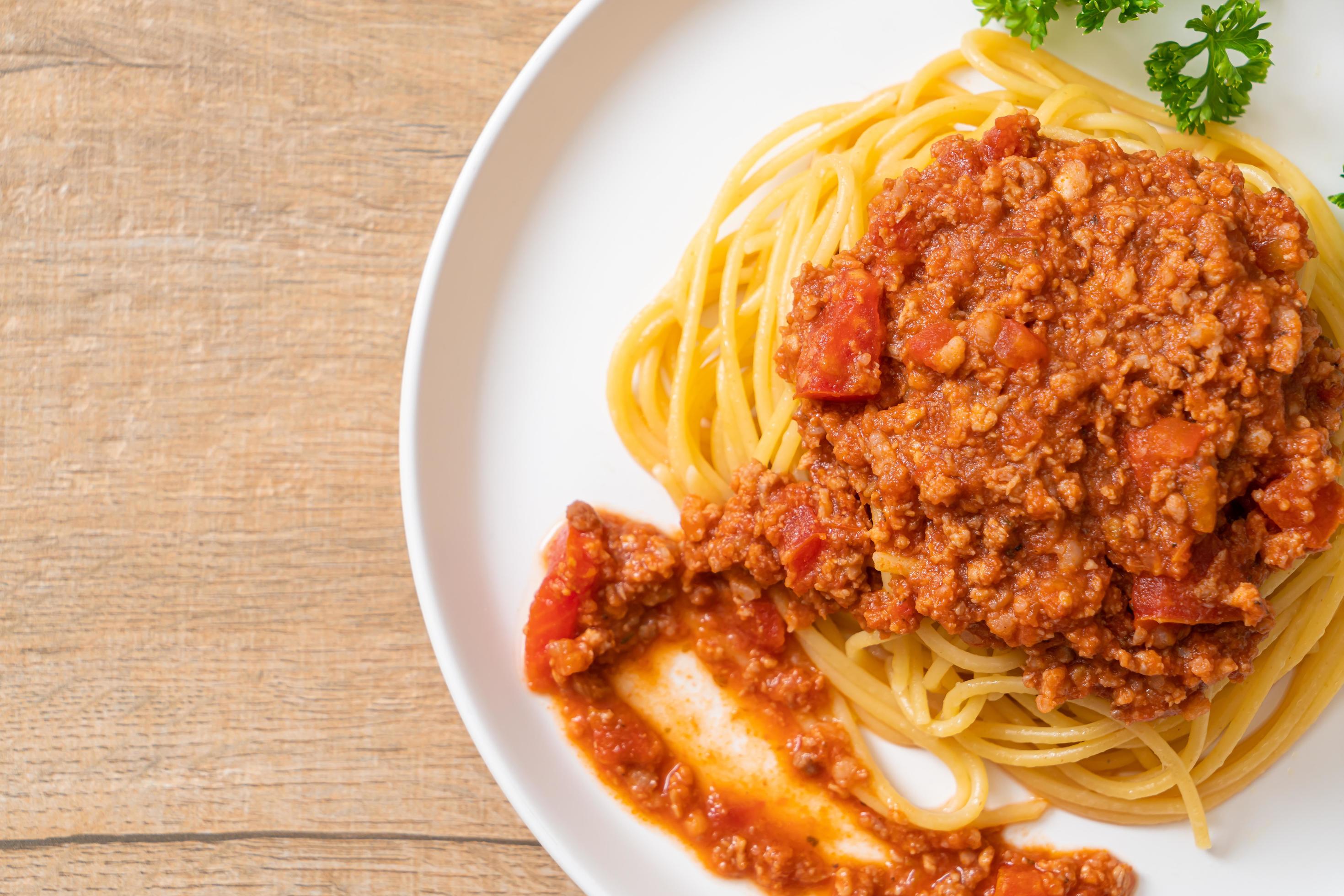 Spaghetti bolognese pork or spaghetti with minced pork tomato sauce – Italian food style Stock Free