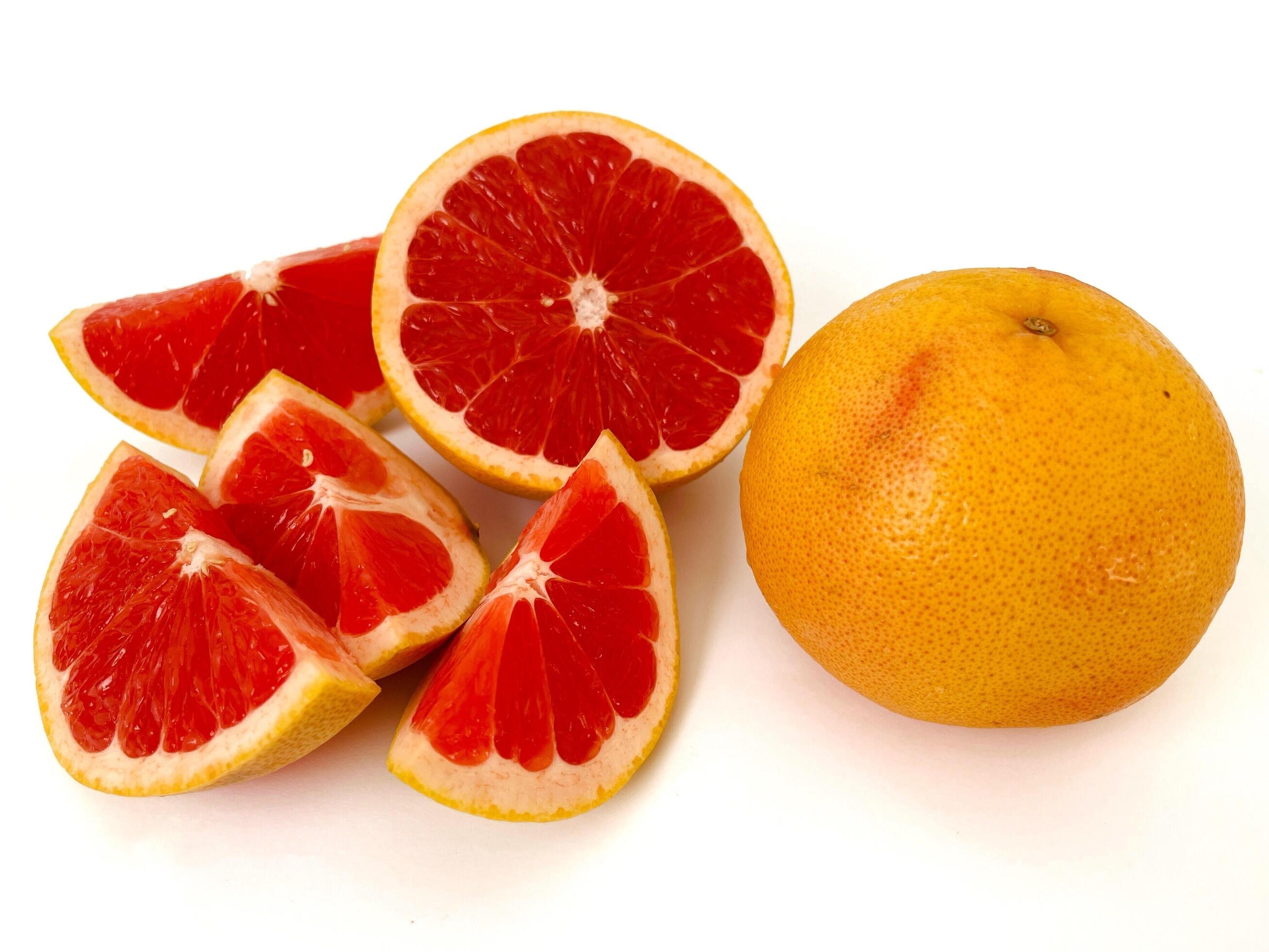 Fresh grapefruit fruit. Grapefruit isolated on white background. Grapefruit with clipping path. Stock Free