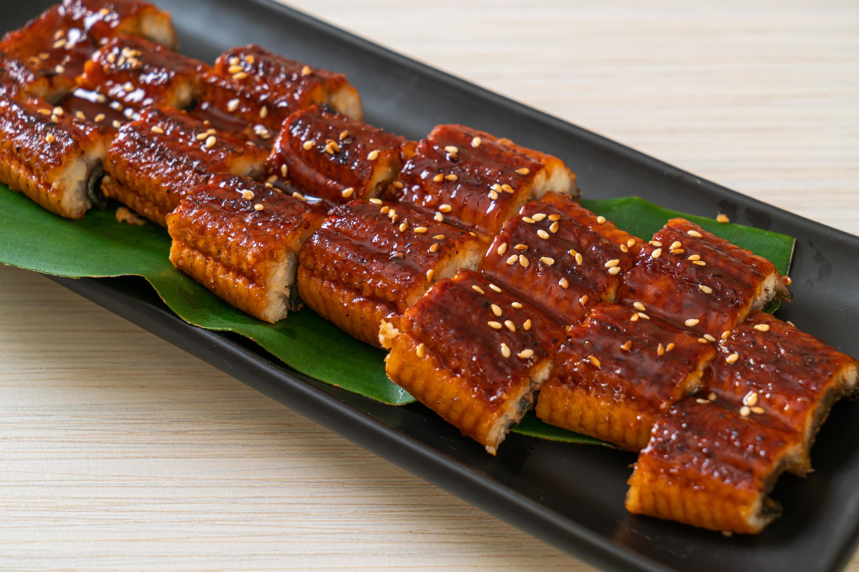 Sliced grilled eel or grilled unagi with sauce -Kabayaki – Japanese food style Stock Free