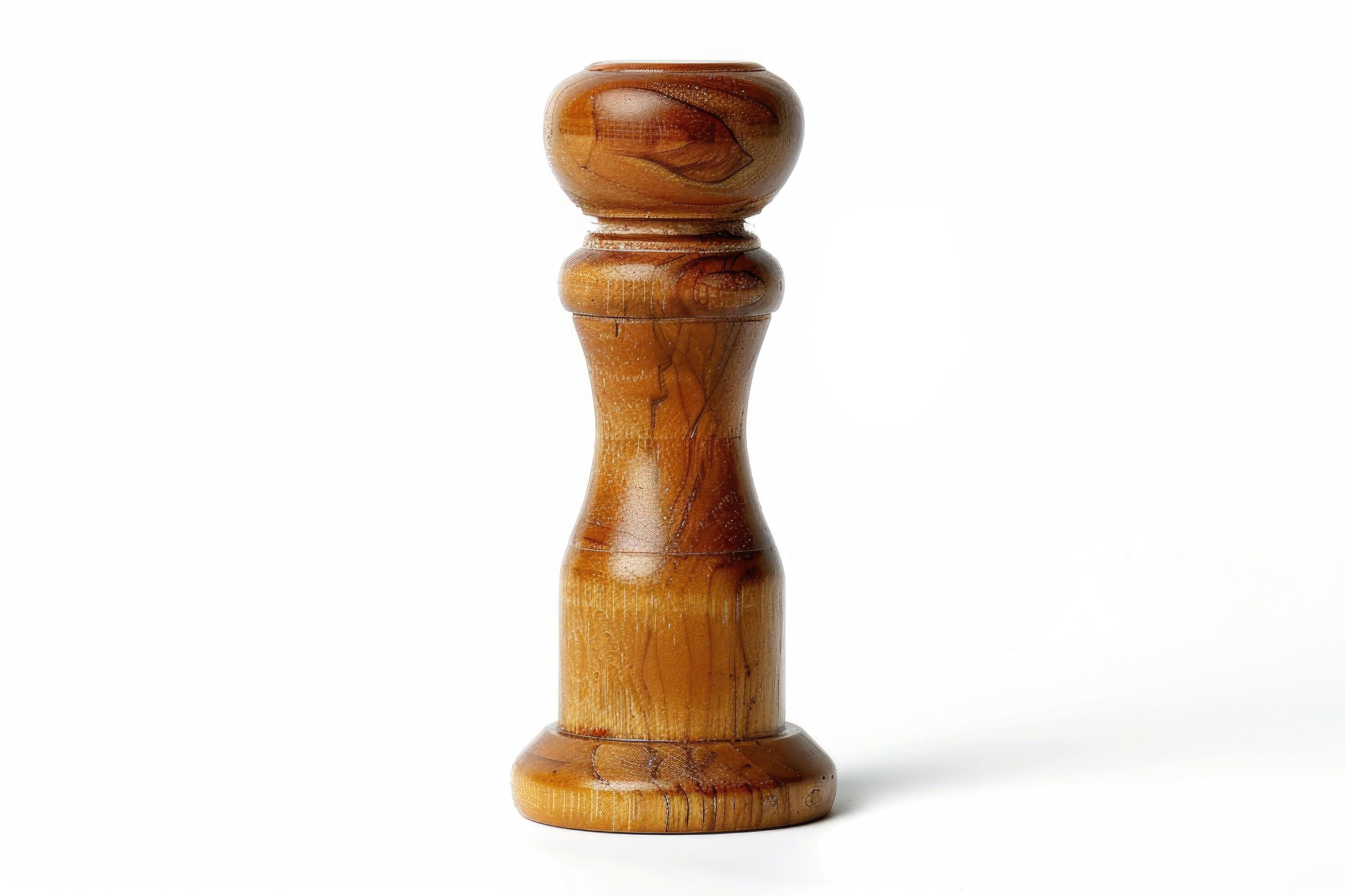 Wooden pepper mill on a white background. Stock Free