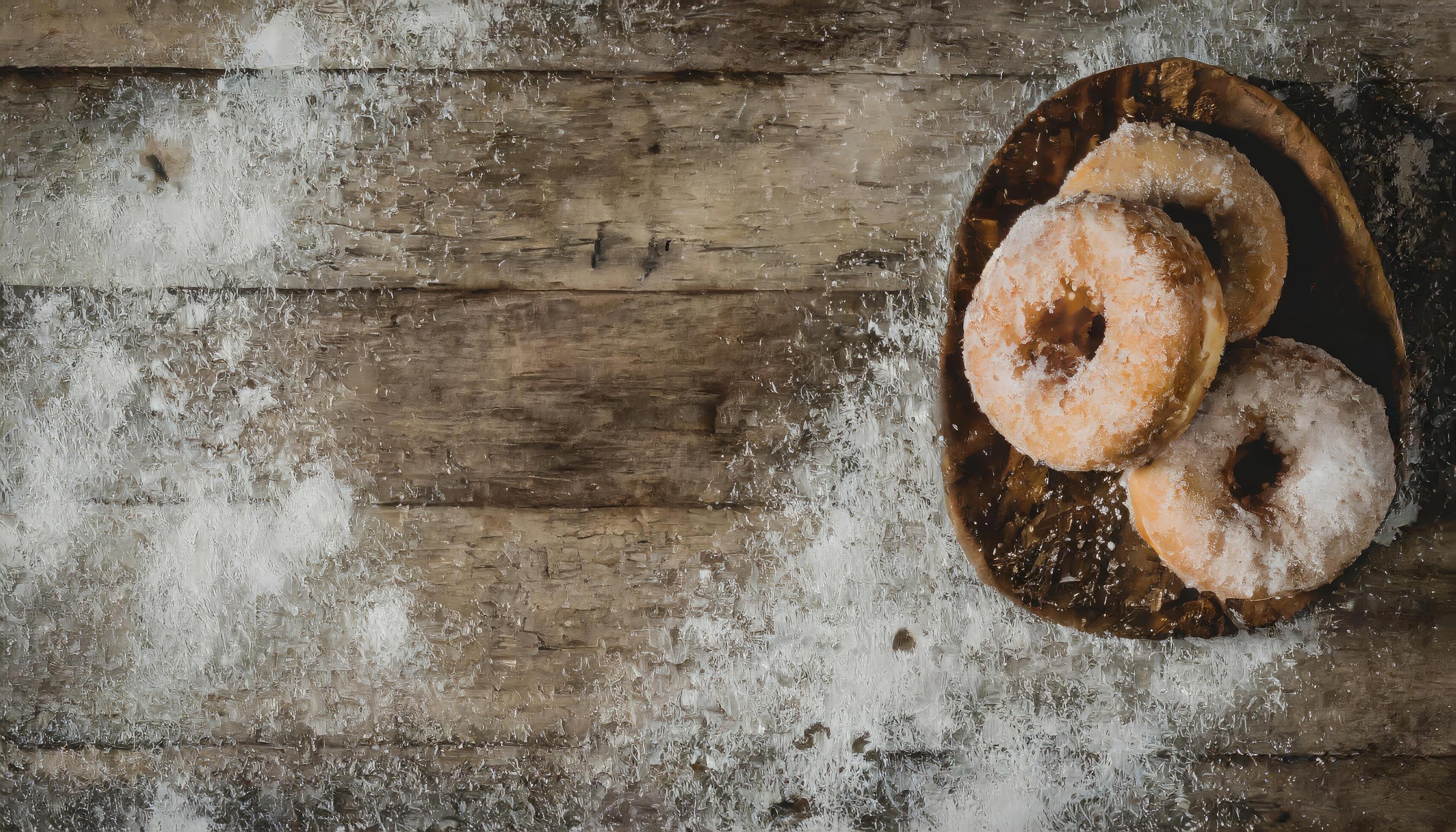 Copy Space image of Donuts with powdered sugar on wooden table on black background Stock Free