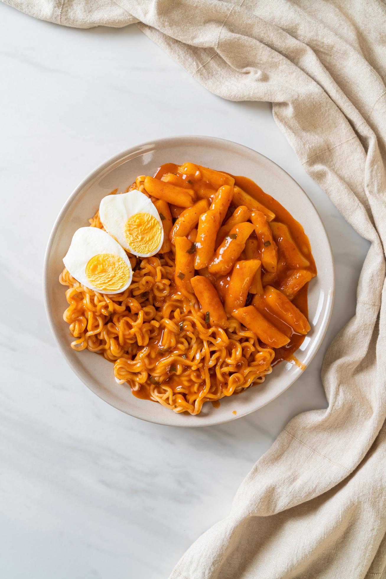 Rabokki, Ramen or Korean instant noodle and Tteokbokki in spicy Korean sauce – Korean food style Stock Free