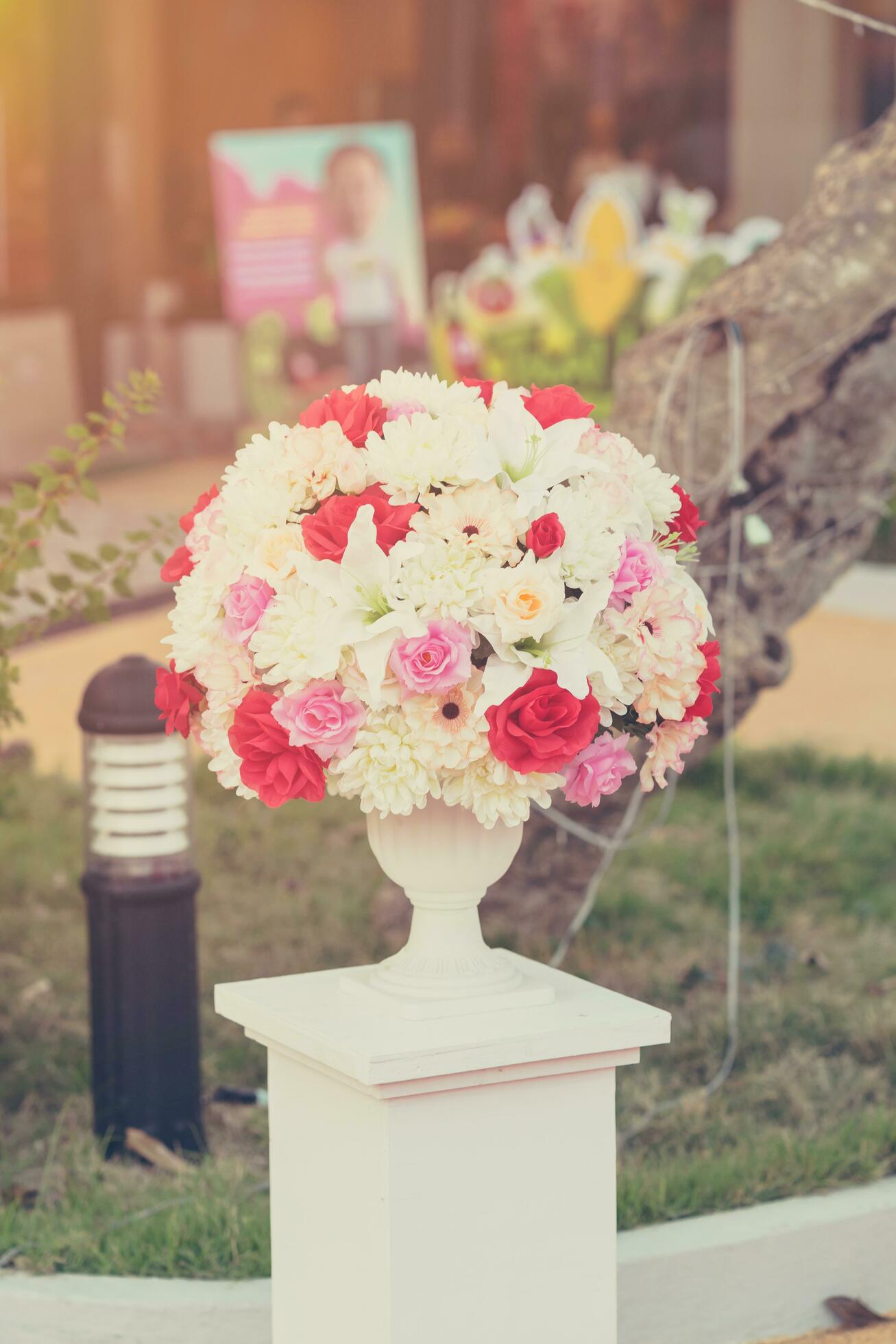 Colorful decoration artificial flower with vintage toned. Stock Free