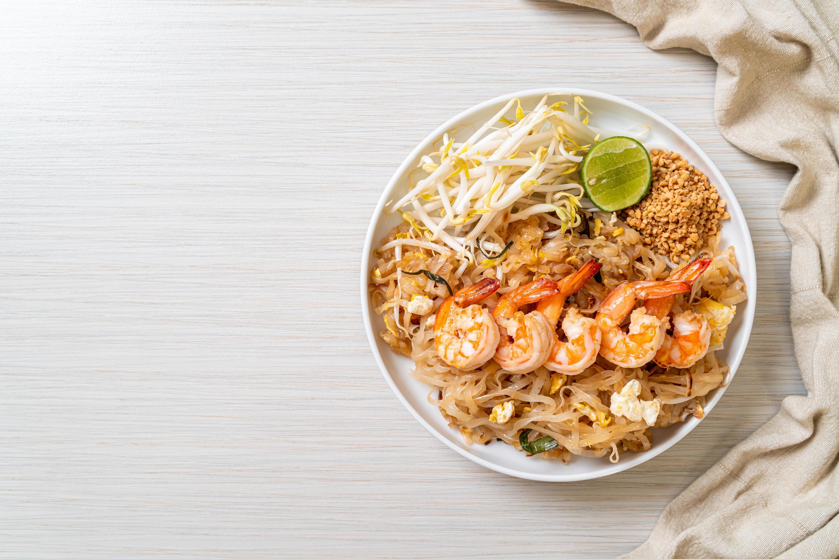 Stir-fried noodles with shrimp and sprouts or Pad Thai – Asian food style Stock Free