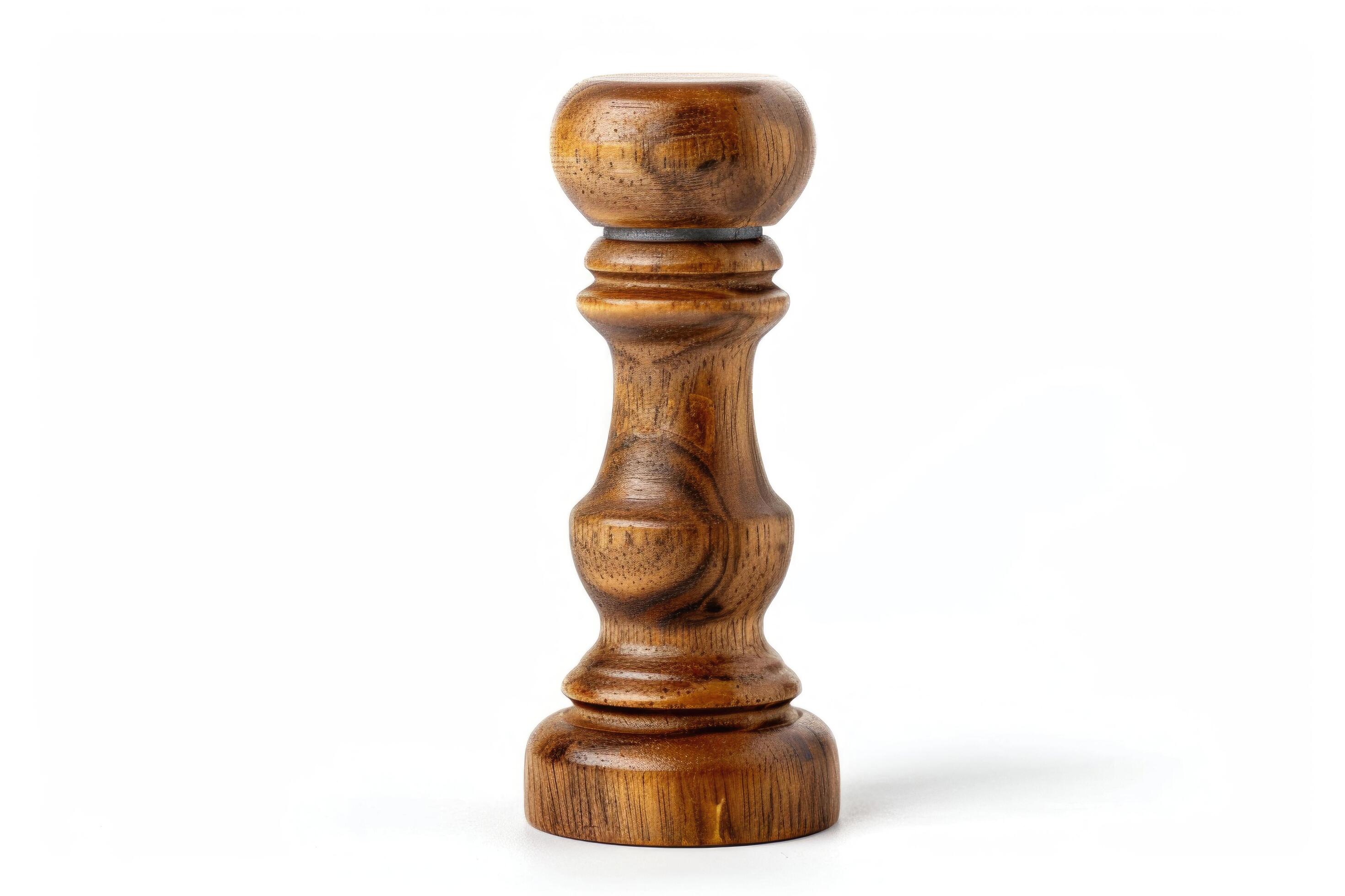 Wooden pepper mill on a white background. Stock Free